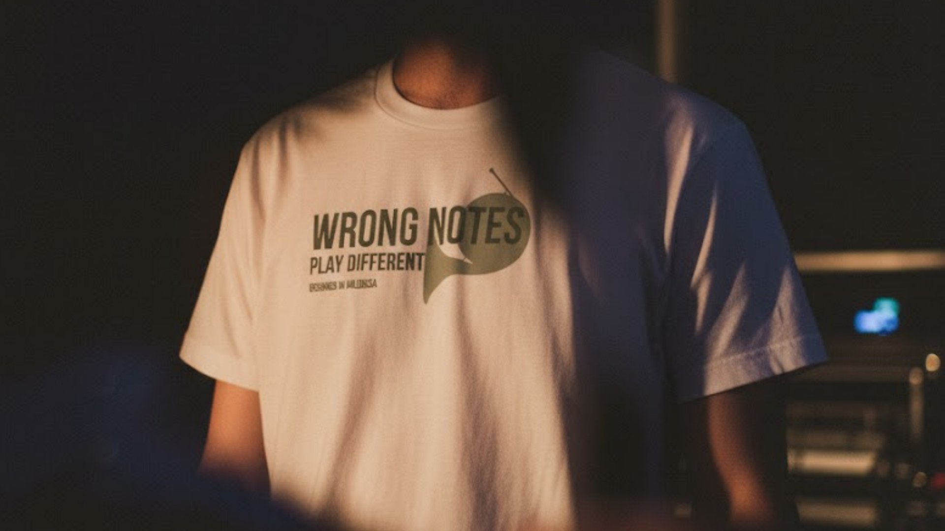 person wearing grey knit sweater