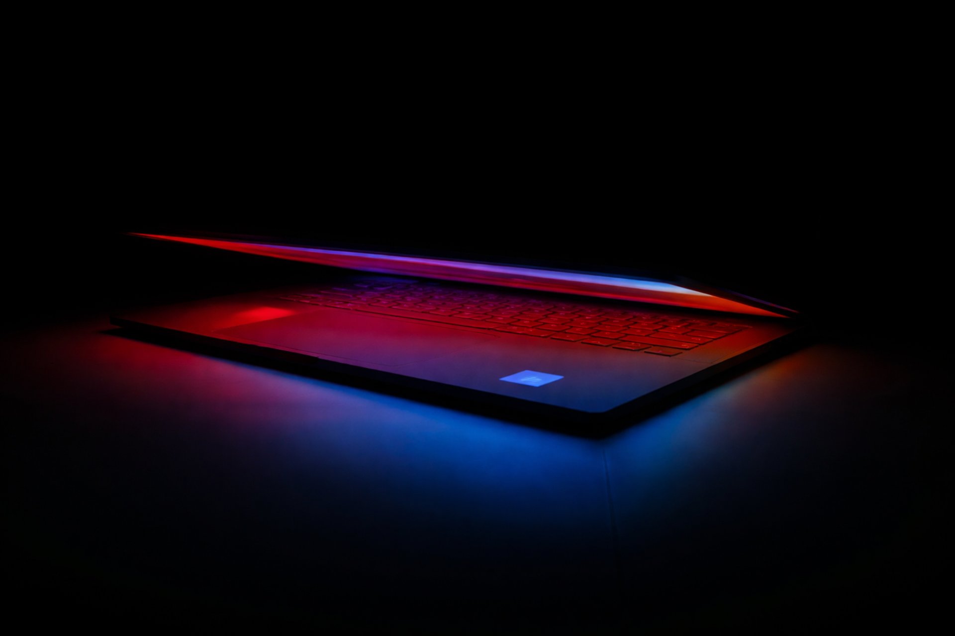 a laptop with a red light