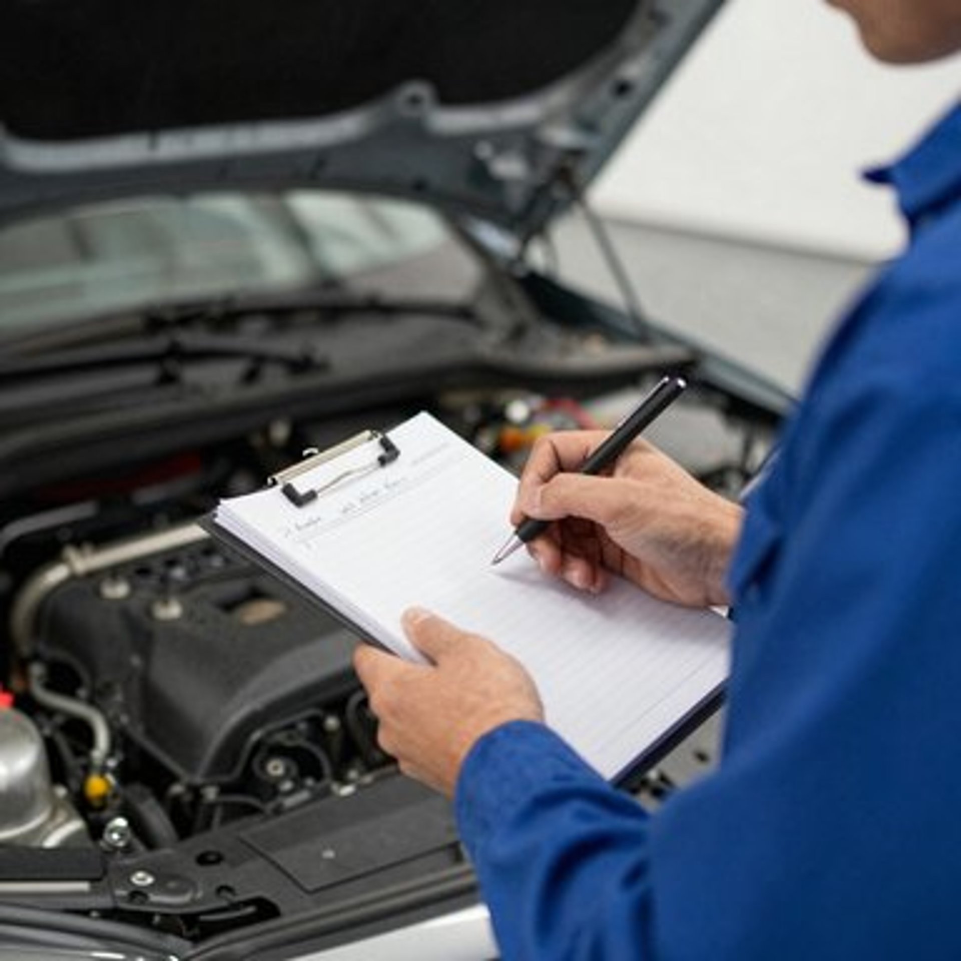 20 point car engine being inspected