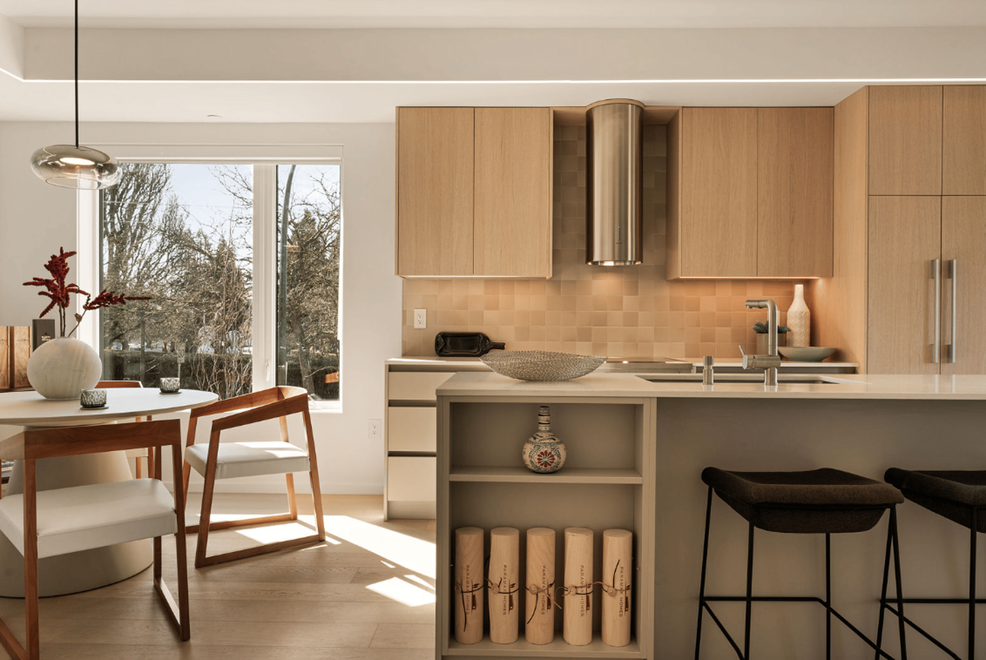 an abstract photo of a curved building with a blue sky in the background