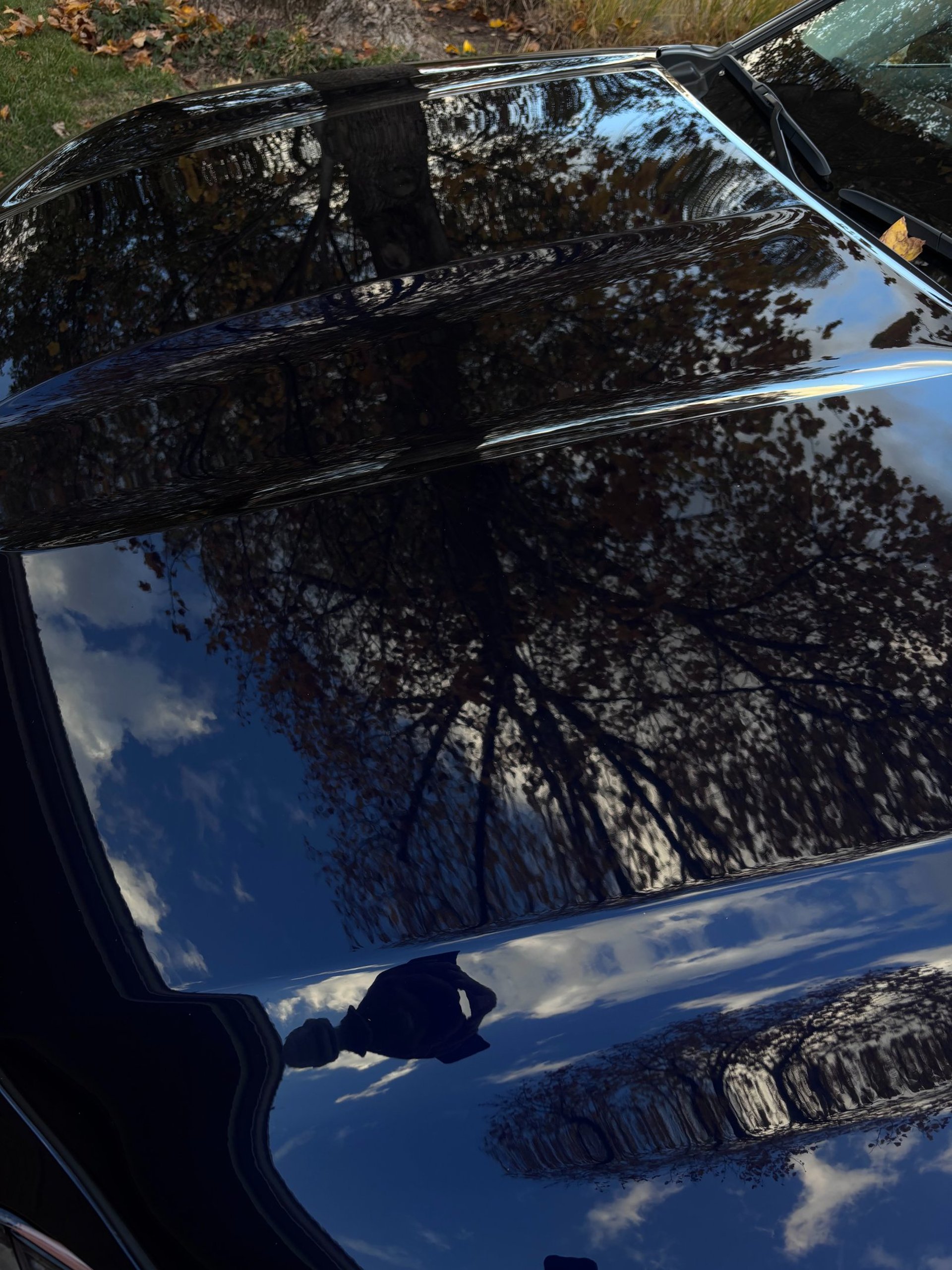 woman wearing yellow long-sleeved dress under white clouds and blue sky during daytime