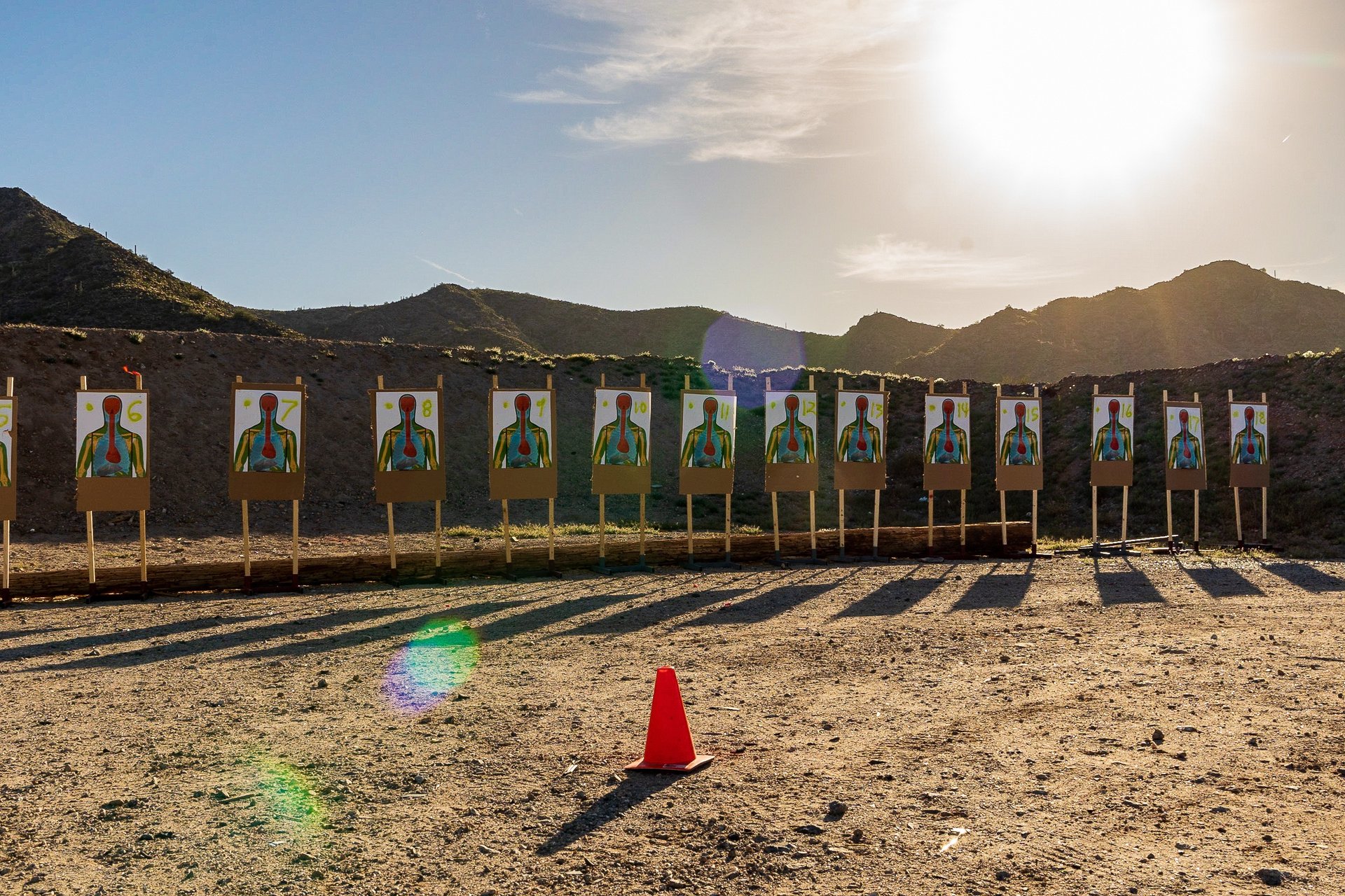 an abstract photo of a curved building with a blue sky in the background