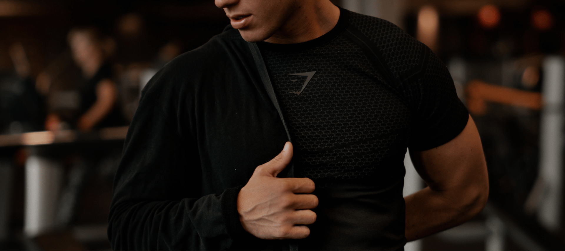 an abstract photo of a curved building with a blue sky in the background