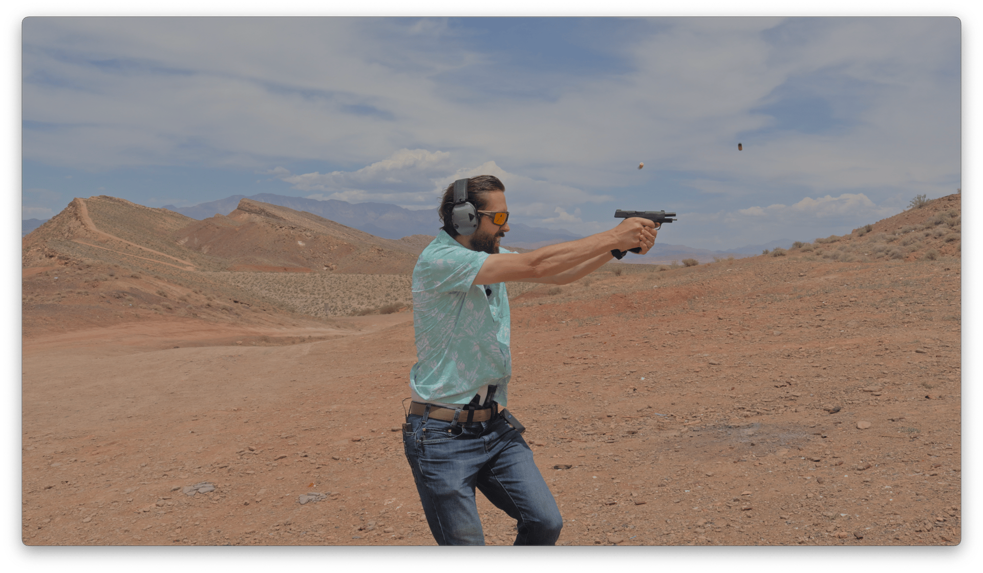 an abstract photo of a curved building with a blue sky in the background