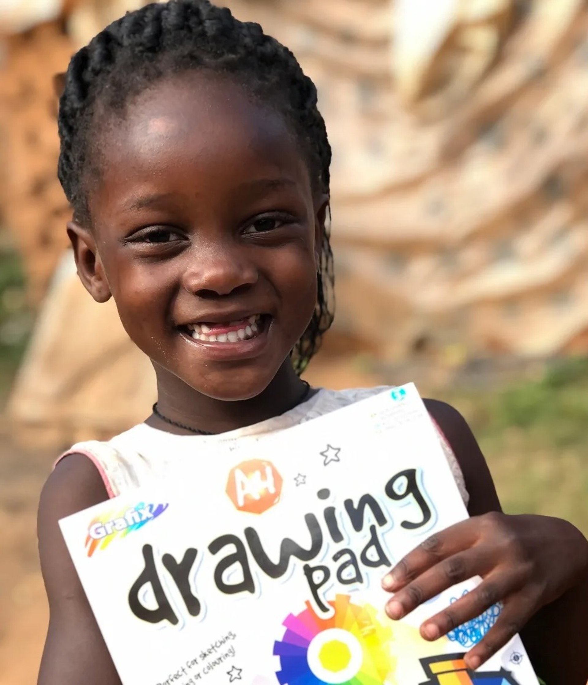 black bell on brown tree branch during daytime