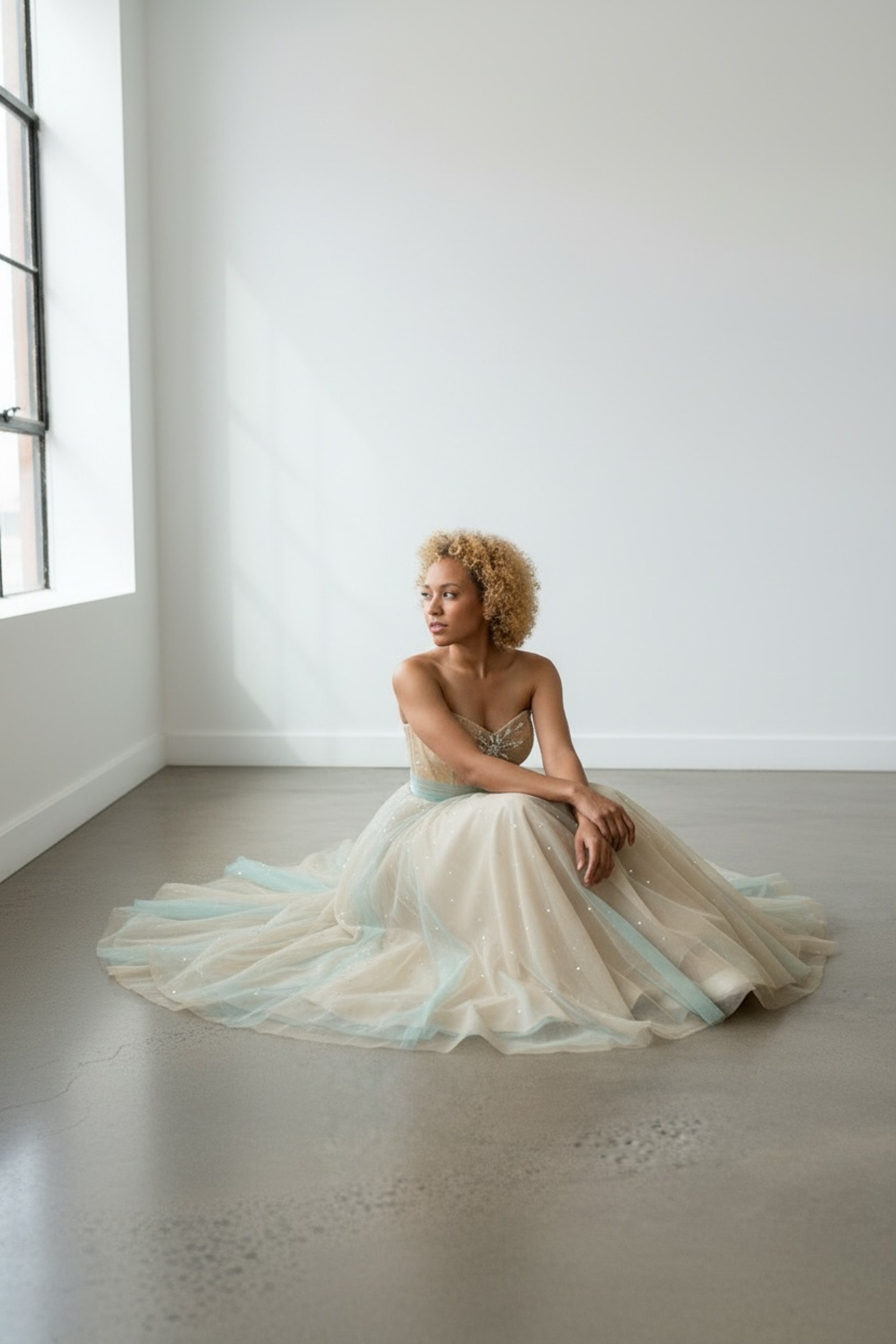 Two designers collaborate in a fashion studio.