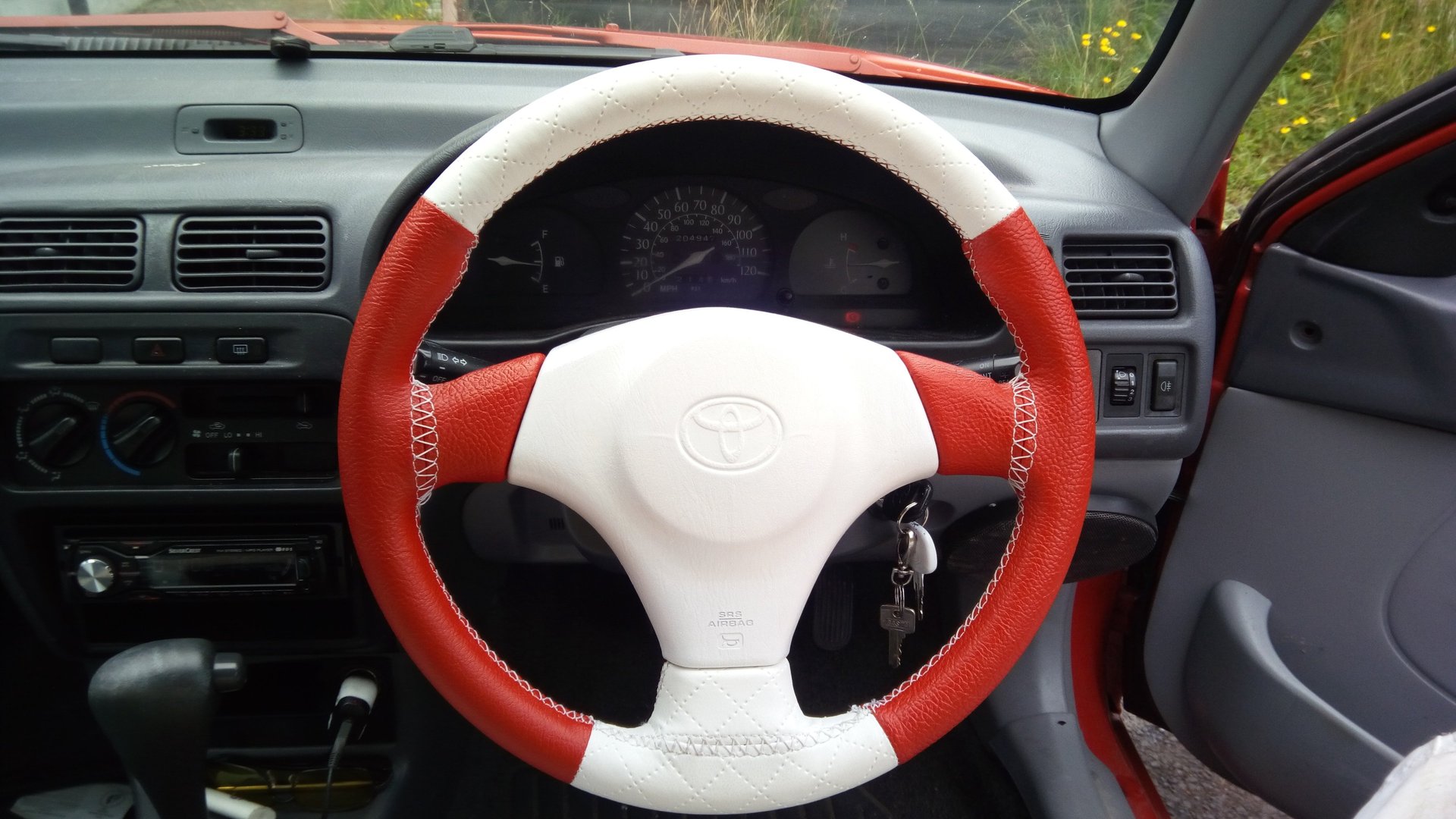 black and brown leather padded tub sofa