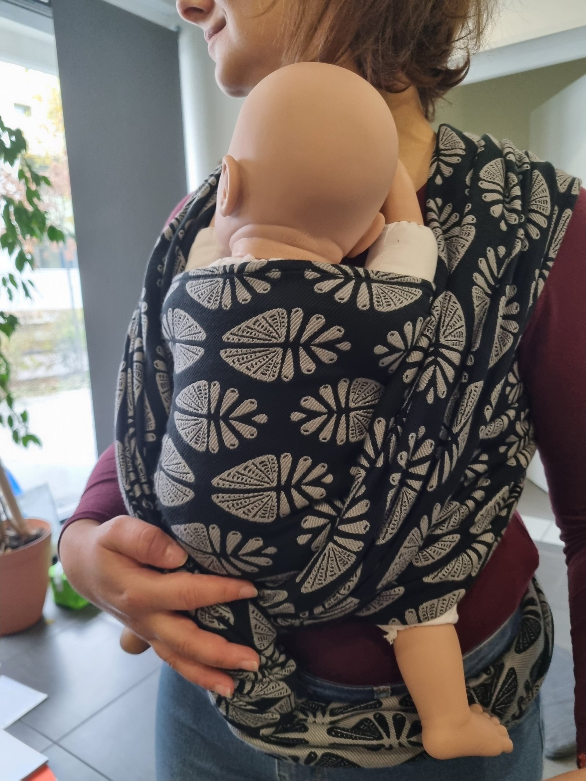 grayscale photo of family's hands