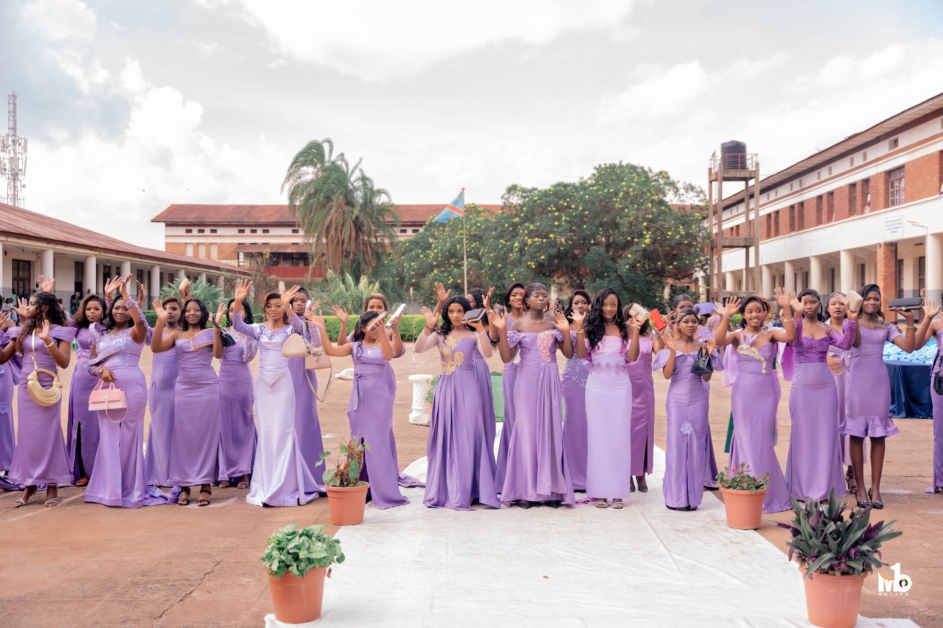 an abstract photo of a curved building with a blue sky in the background