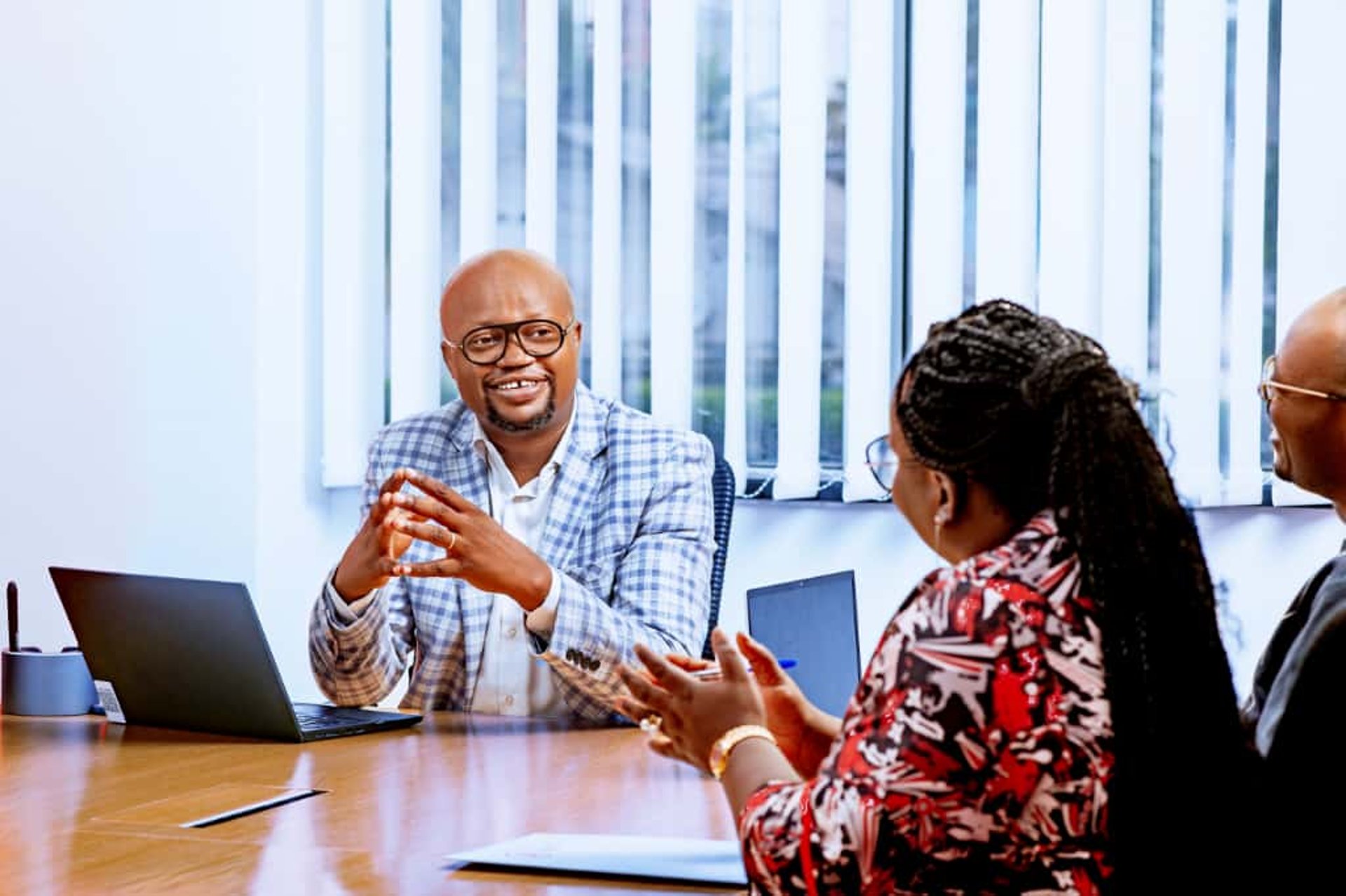 woman wearing yellow long-sleeved dress under white clouds and blue sky during daytime