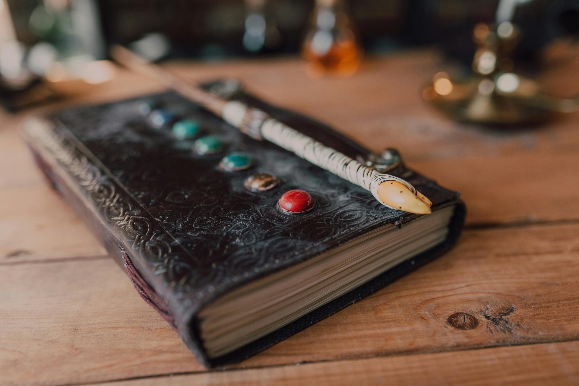 four assorted books on brown wooden table