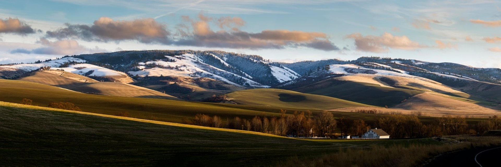 silver round coin on black textile