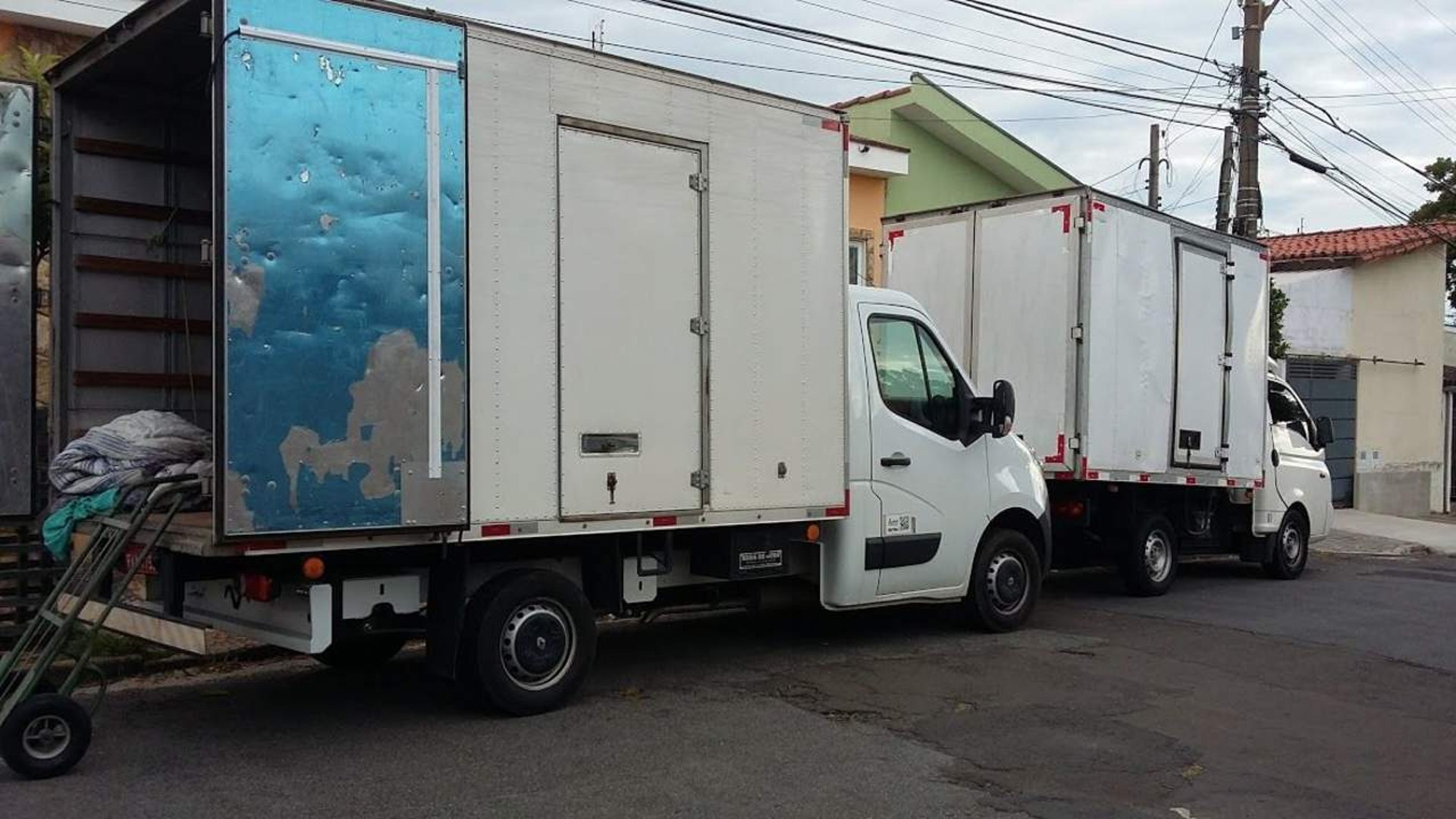 woman wearing yellow long-sleeved dress under white clouds and blue sky during daytime