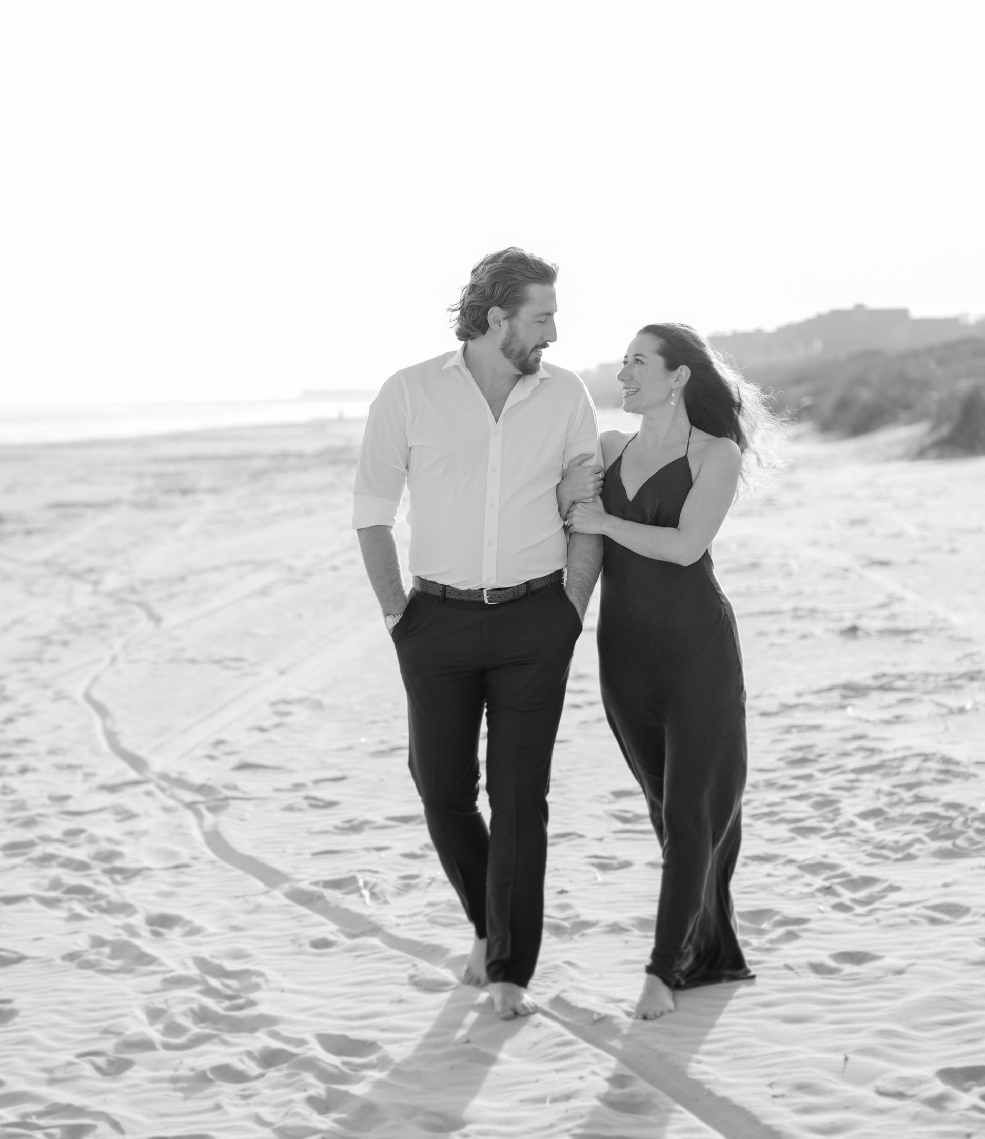 couple wearing silver-colored rings