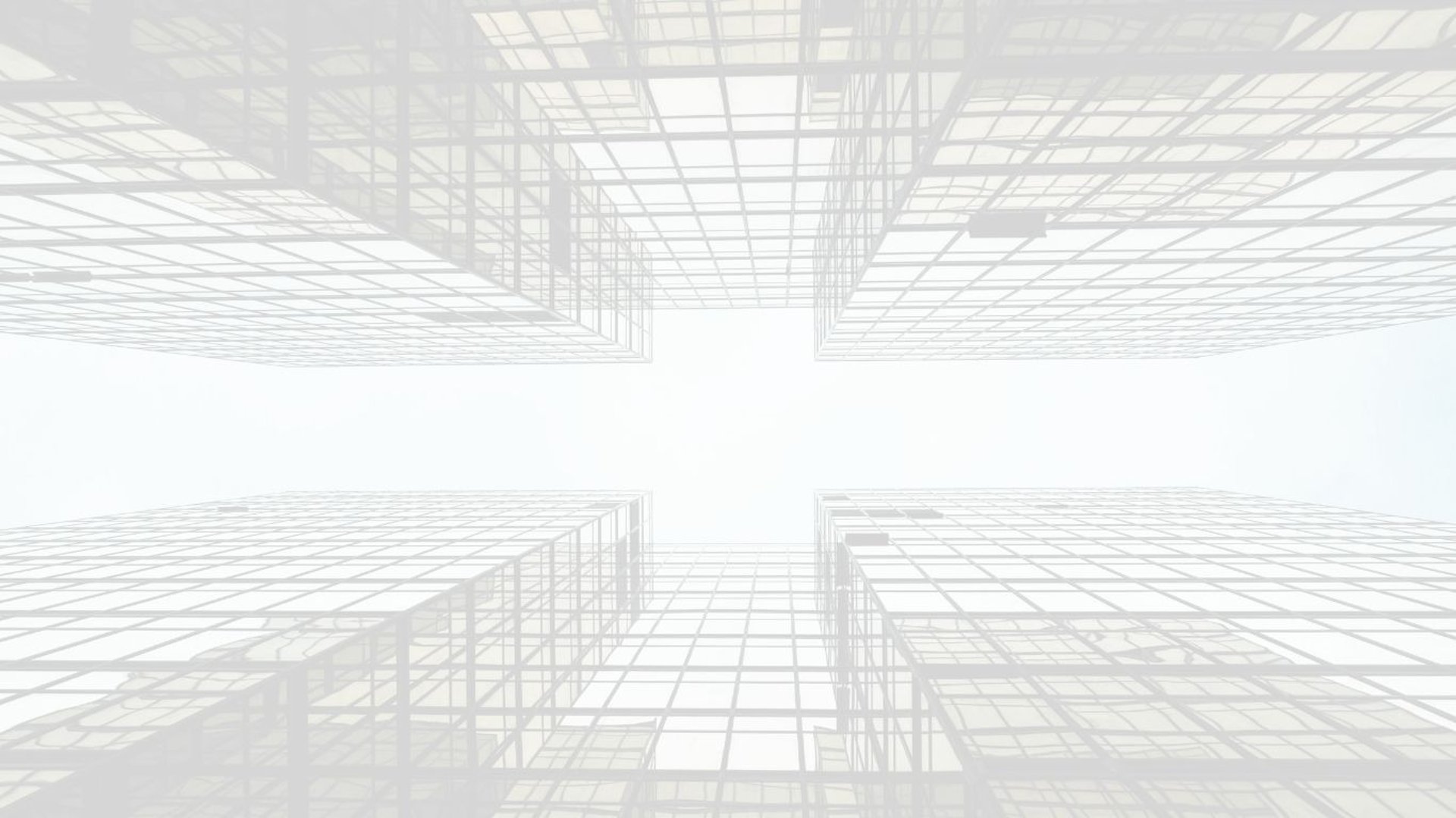 an abstract photo of a curved building with a blue sky in the background