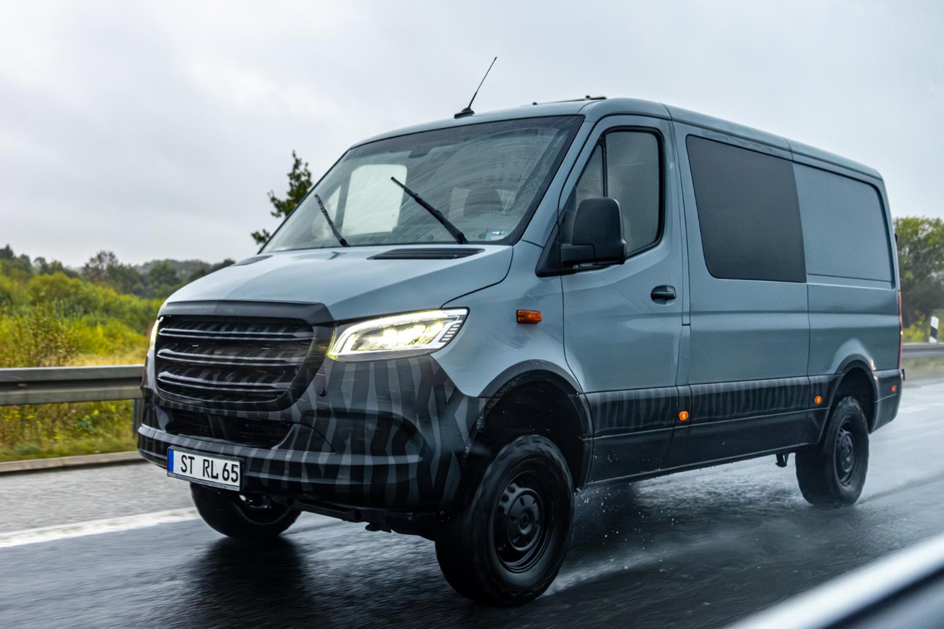 black and brown leather padded tub sofa