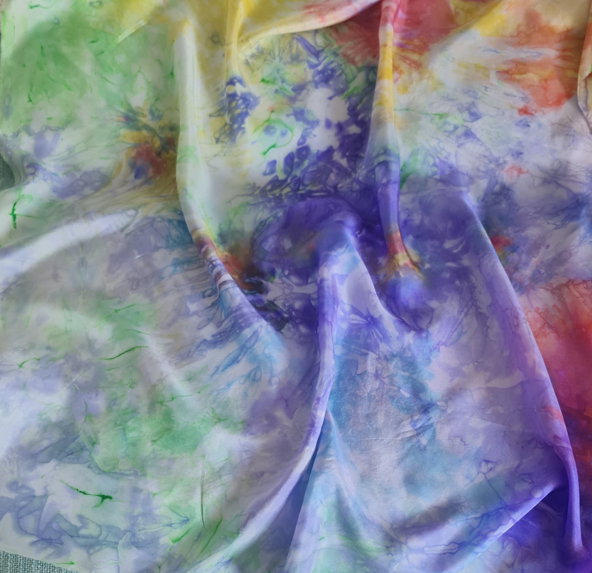 person wearing grey knit sweater