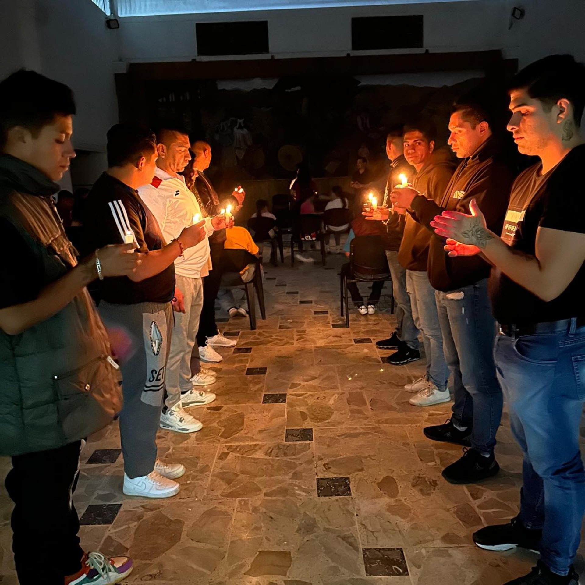 an abstract photo of a curved building with a blue sky in the background