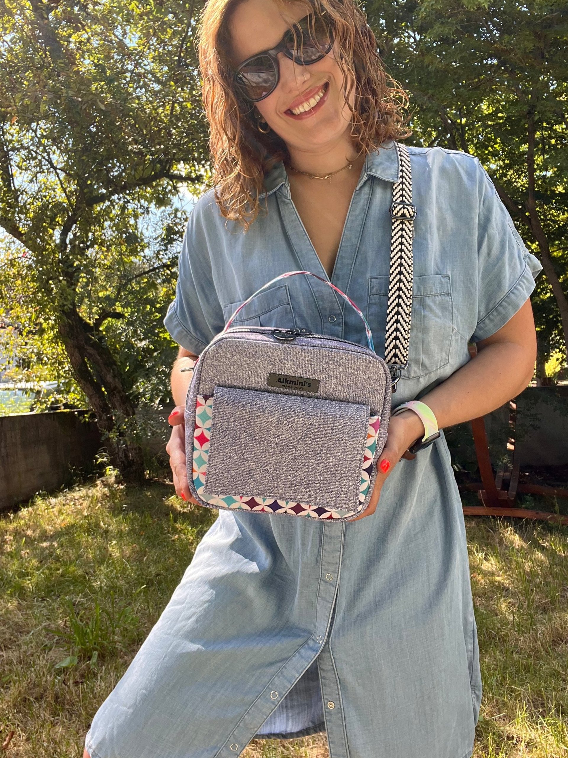 an abstract photo of a curved building with a blue sky in the background