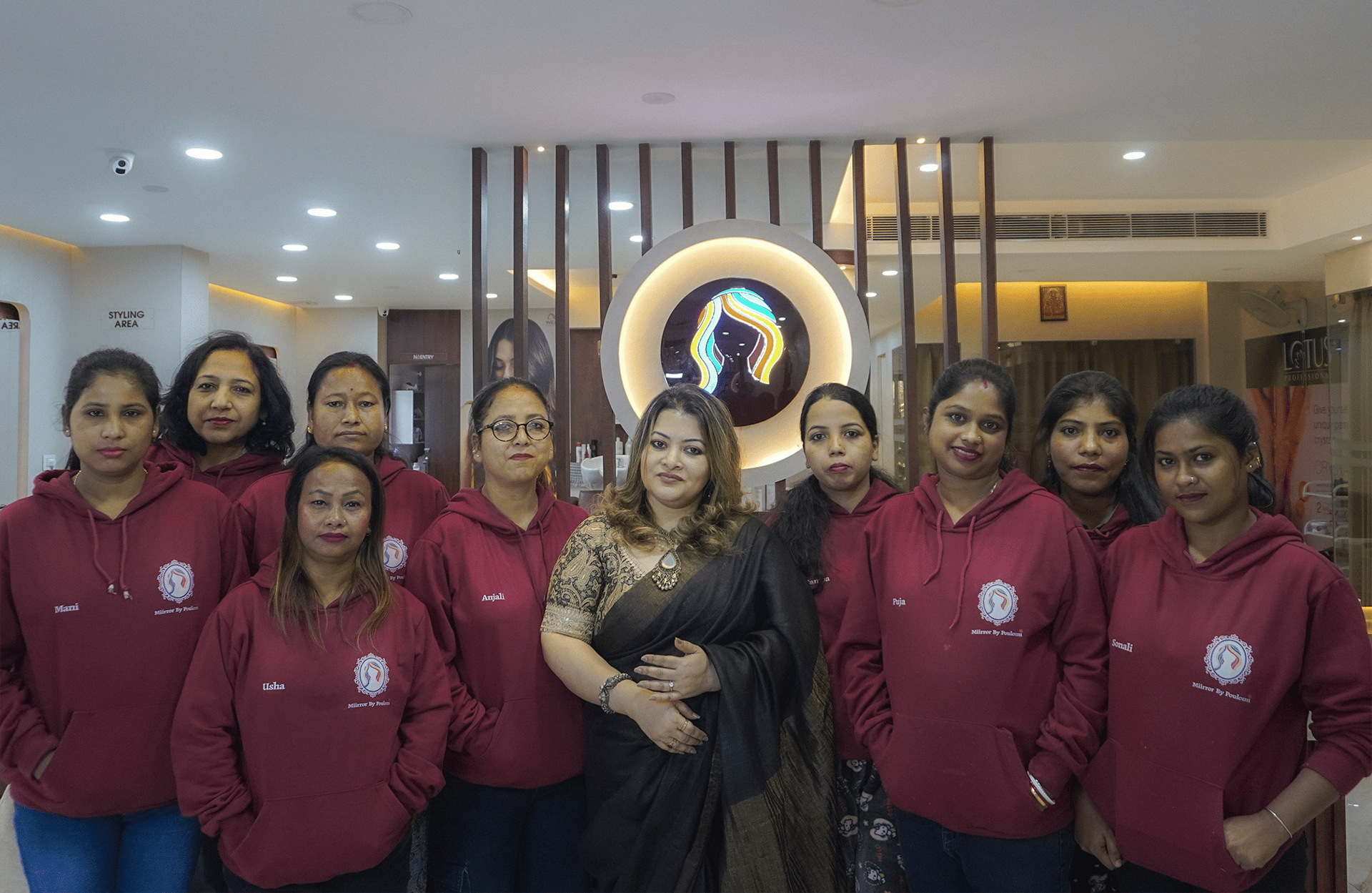 A young woman in a black lace outfit