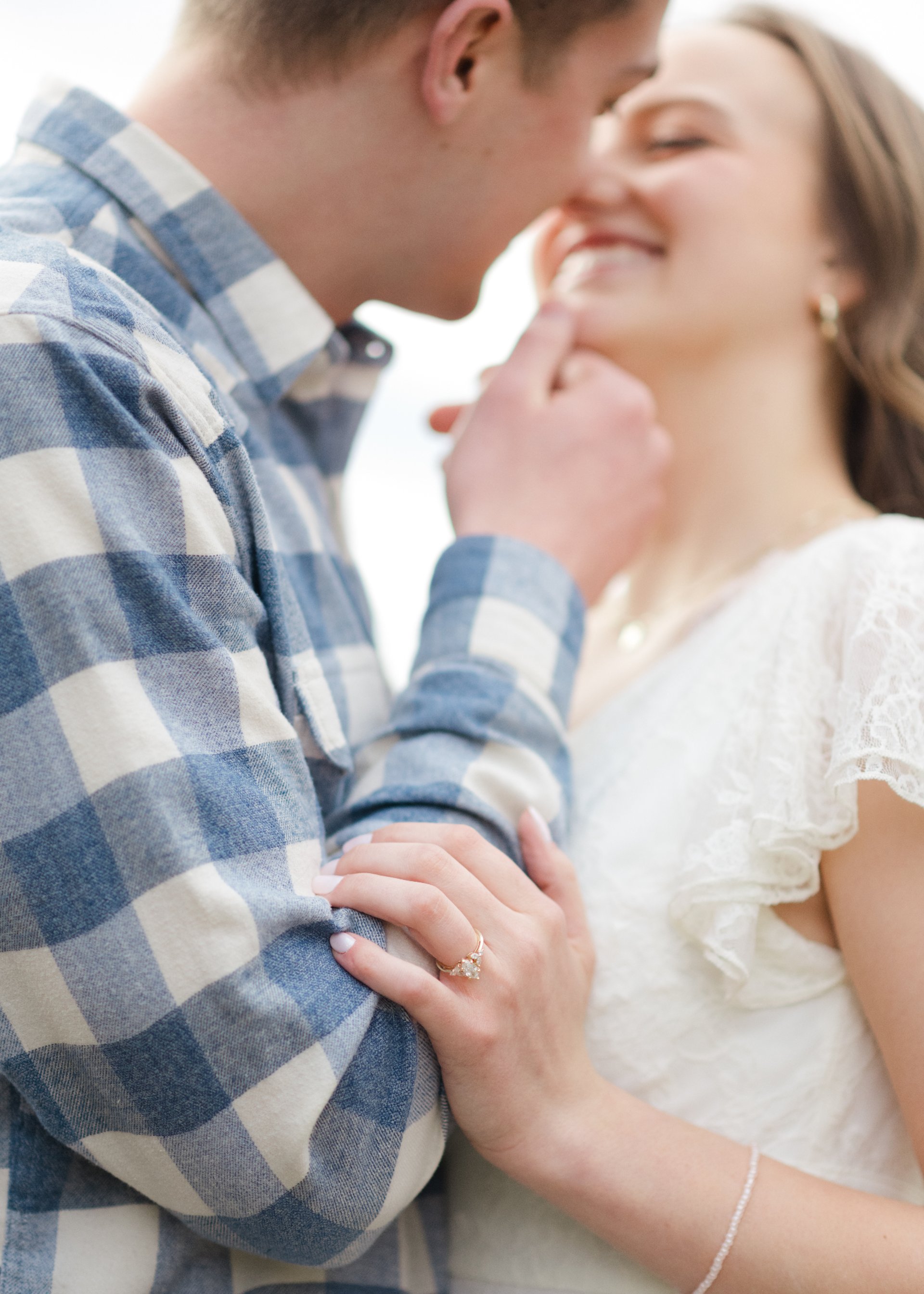 couple wearing silver-colored rings
