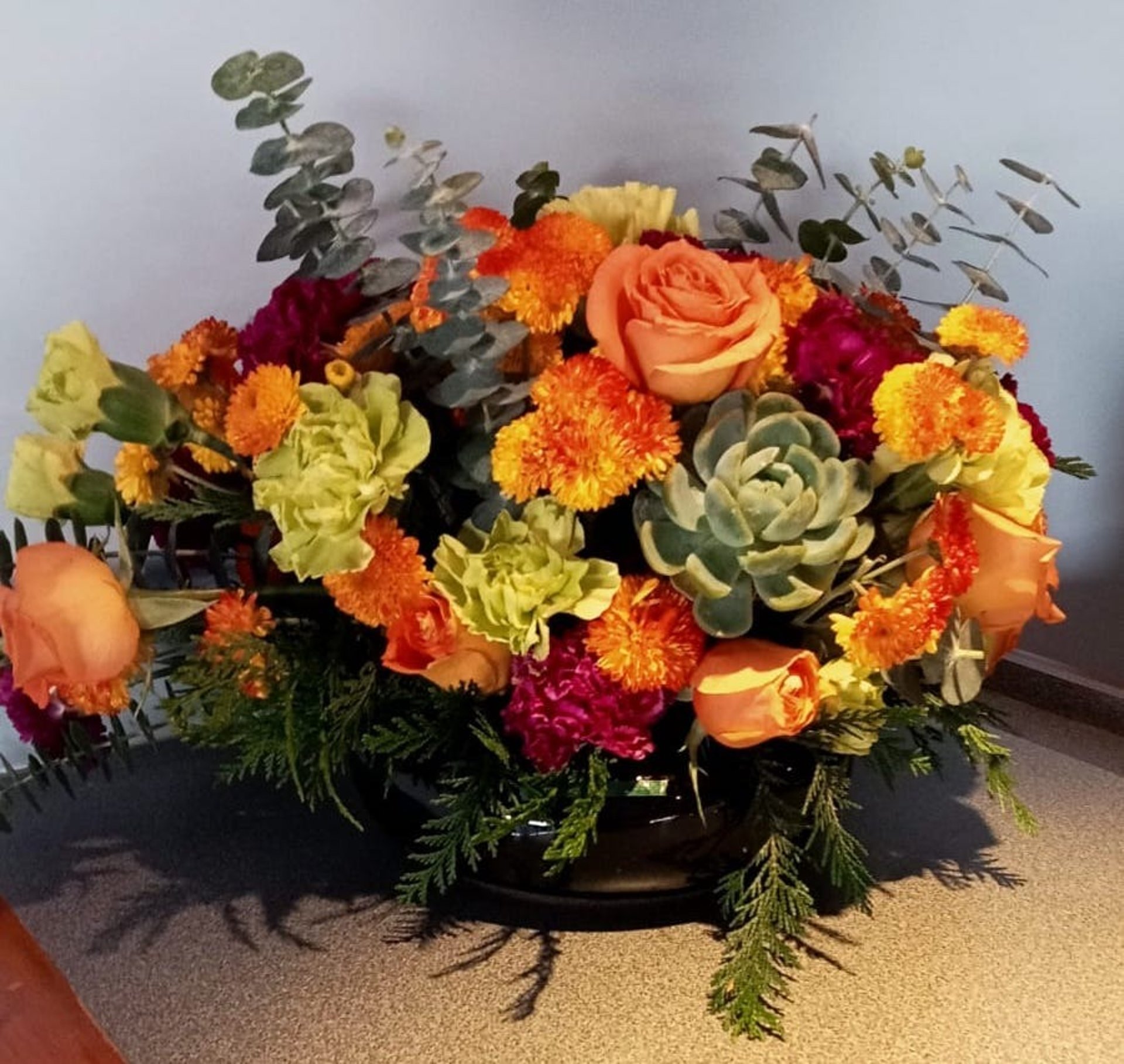 woman wearing yellow long-sleeved dress under white clouds and blue sky during daytime