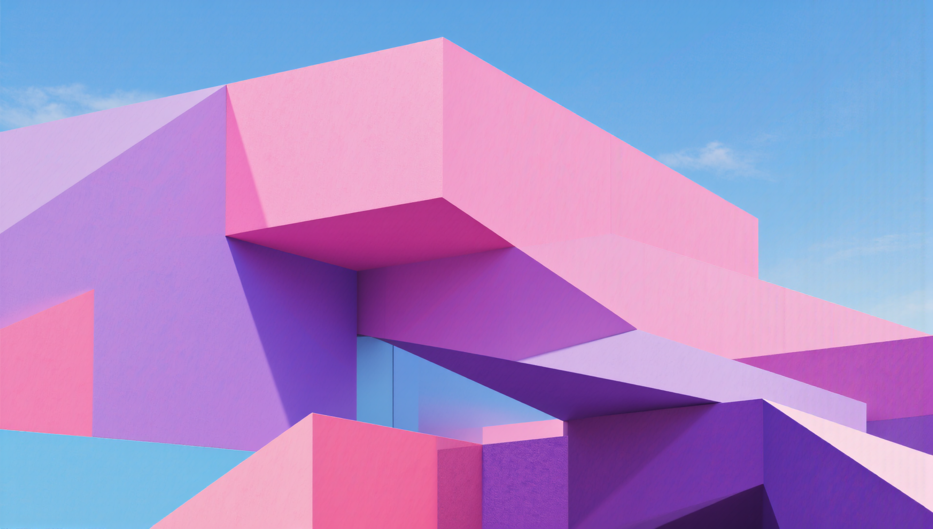 an abstract photo of a curved building with a blue sky in the background