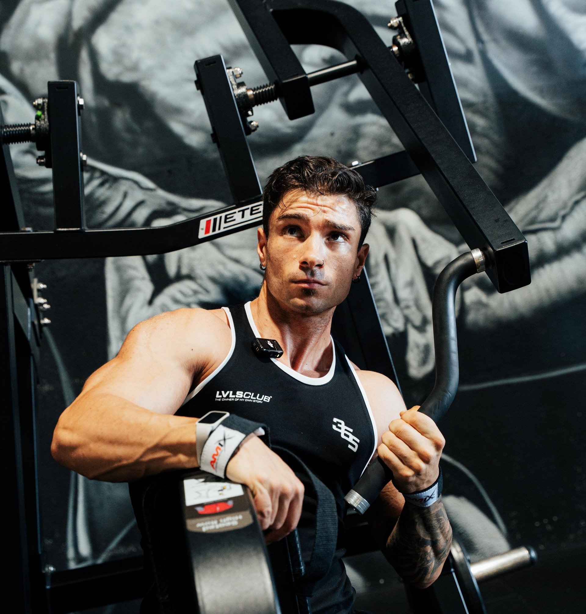 an abstract photo of a curved building with a blue sky in the background