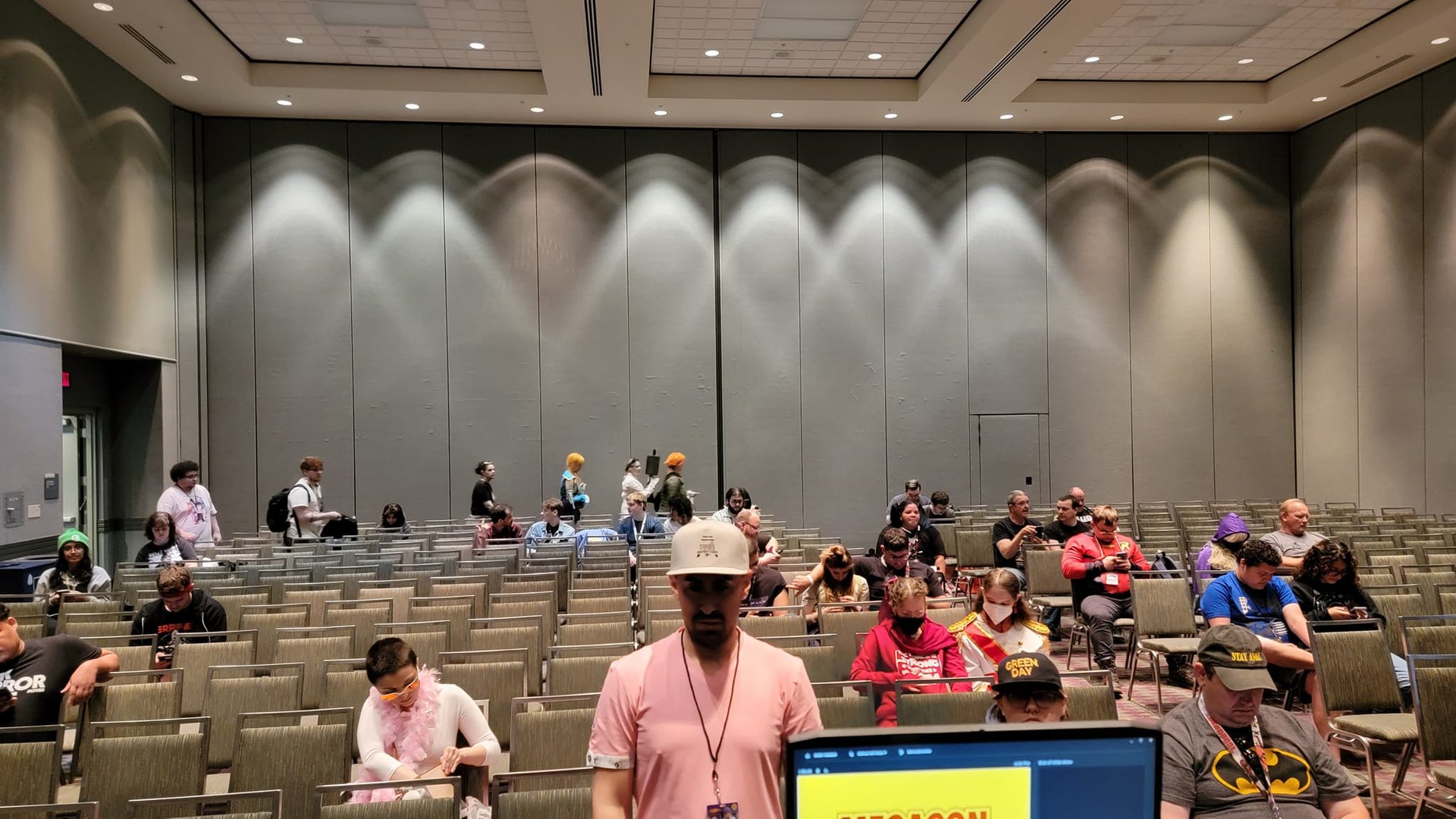 an abstract photo of a curved building with a blue sky in the background