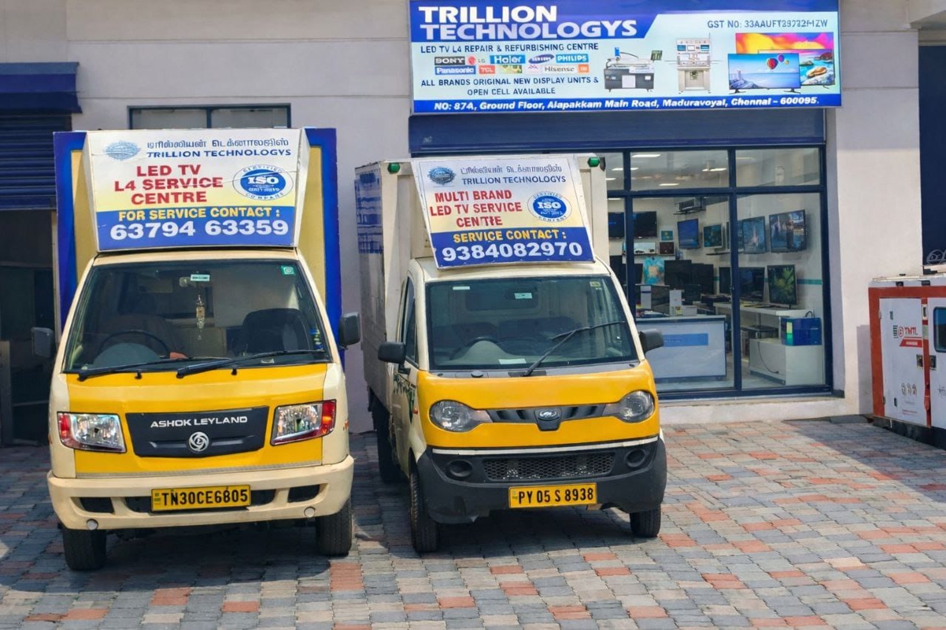 black flat screen tv turned on on brown wooden tv rack