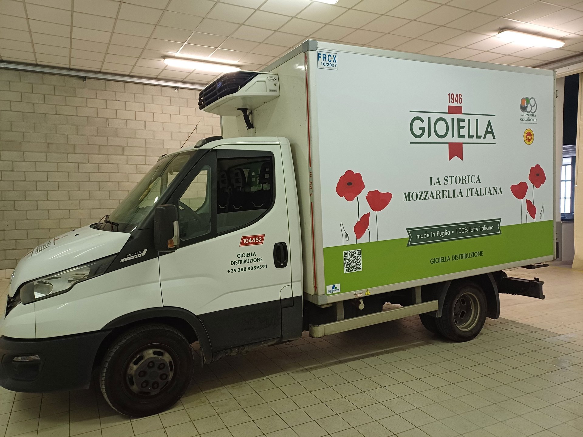 black and yellow bmw m 3 coupe parked near blue wall