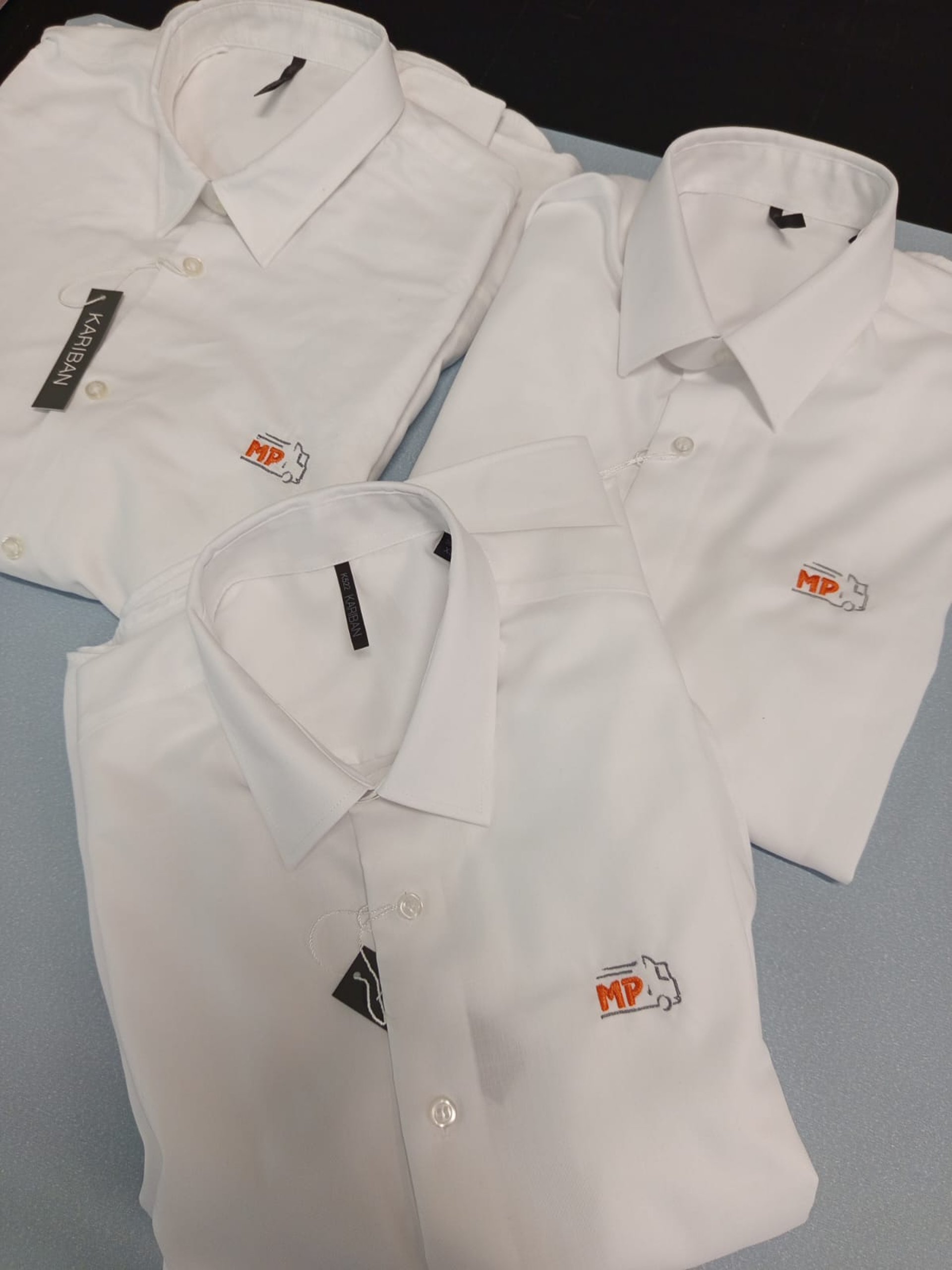 black and yellow bmw m 3 coupe parked near blue wall