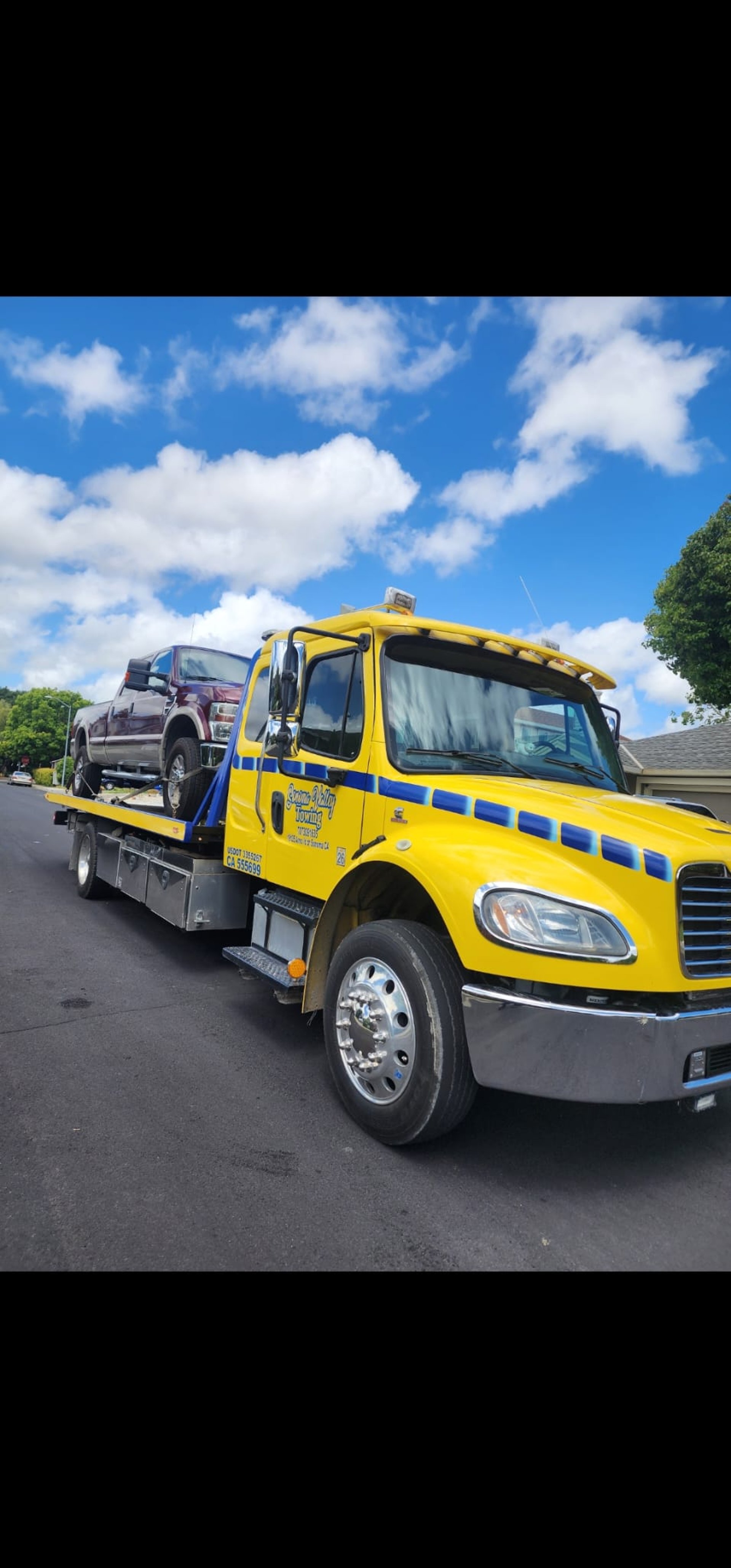 an abstract photo of a curved building with a blue sky in the background
