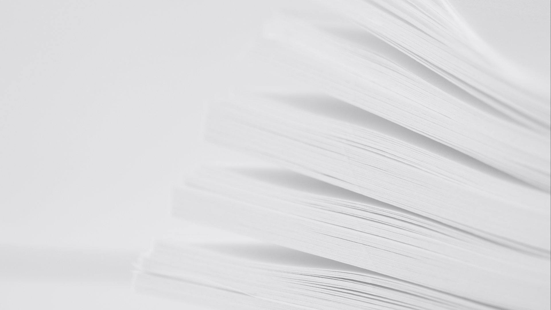 a close up of a white wall with wavy lines