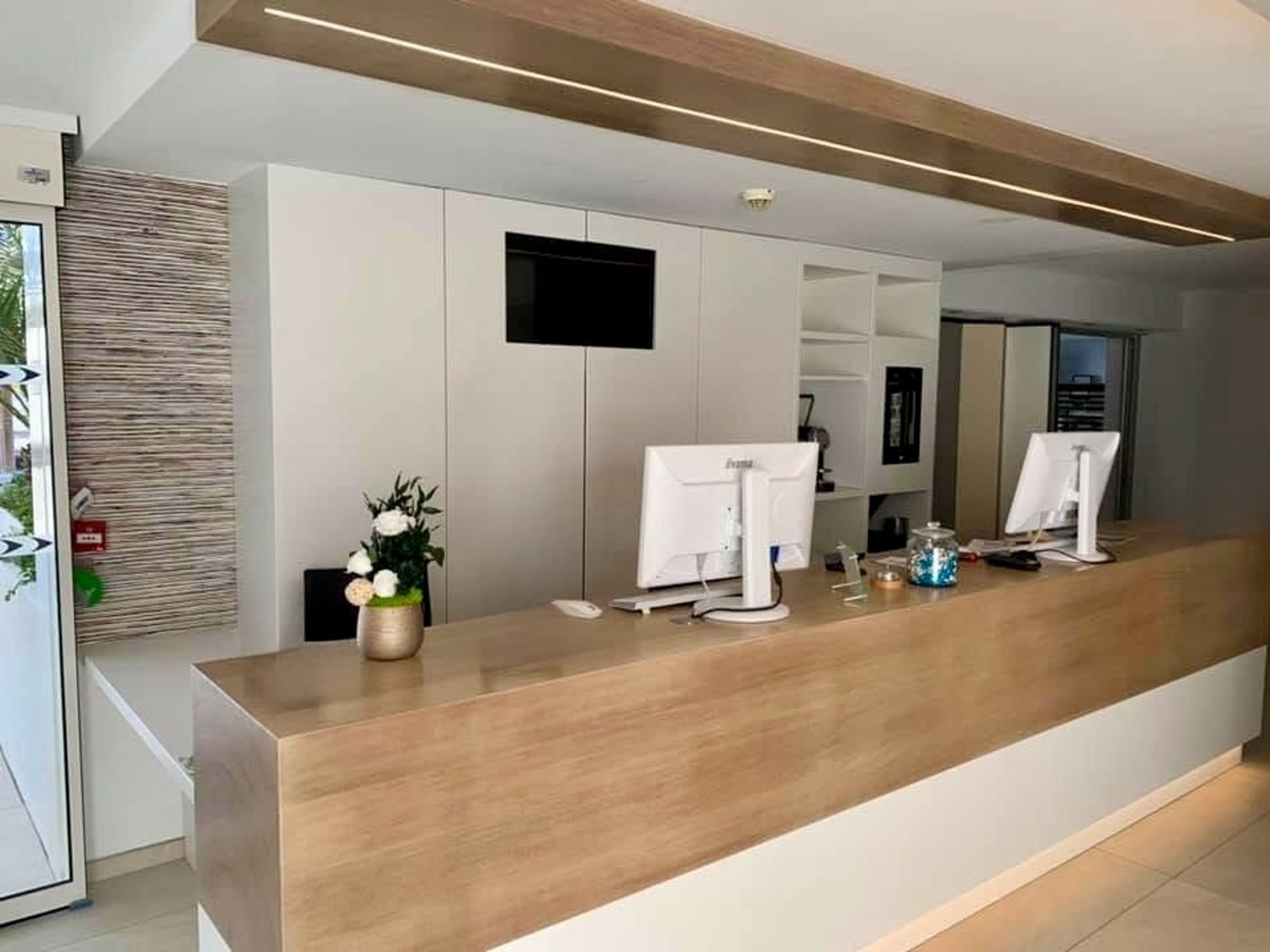 woman wearing yellow long-sleeved dress under white clouds and blue sky during daytime