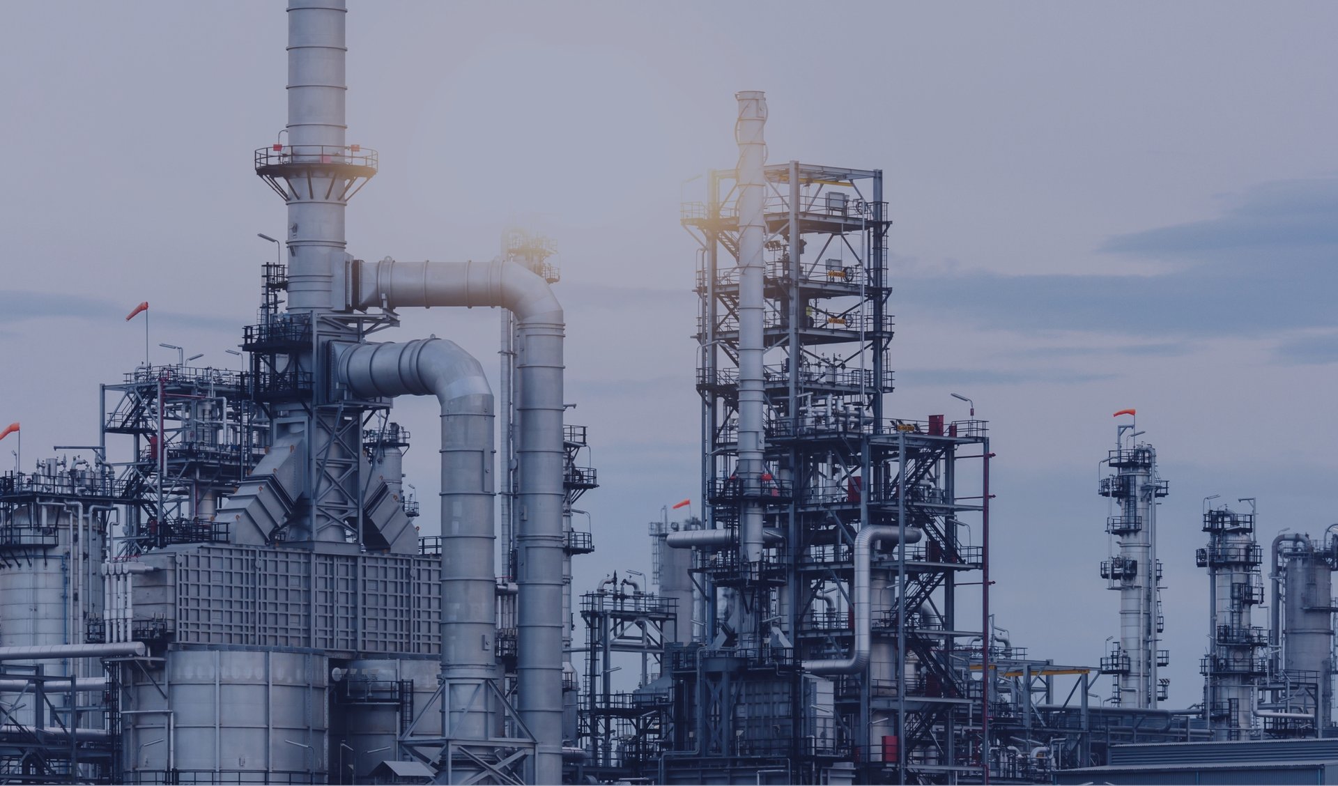 black electric tower under blue sky during daytime