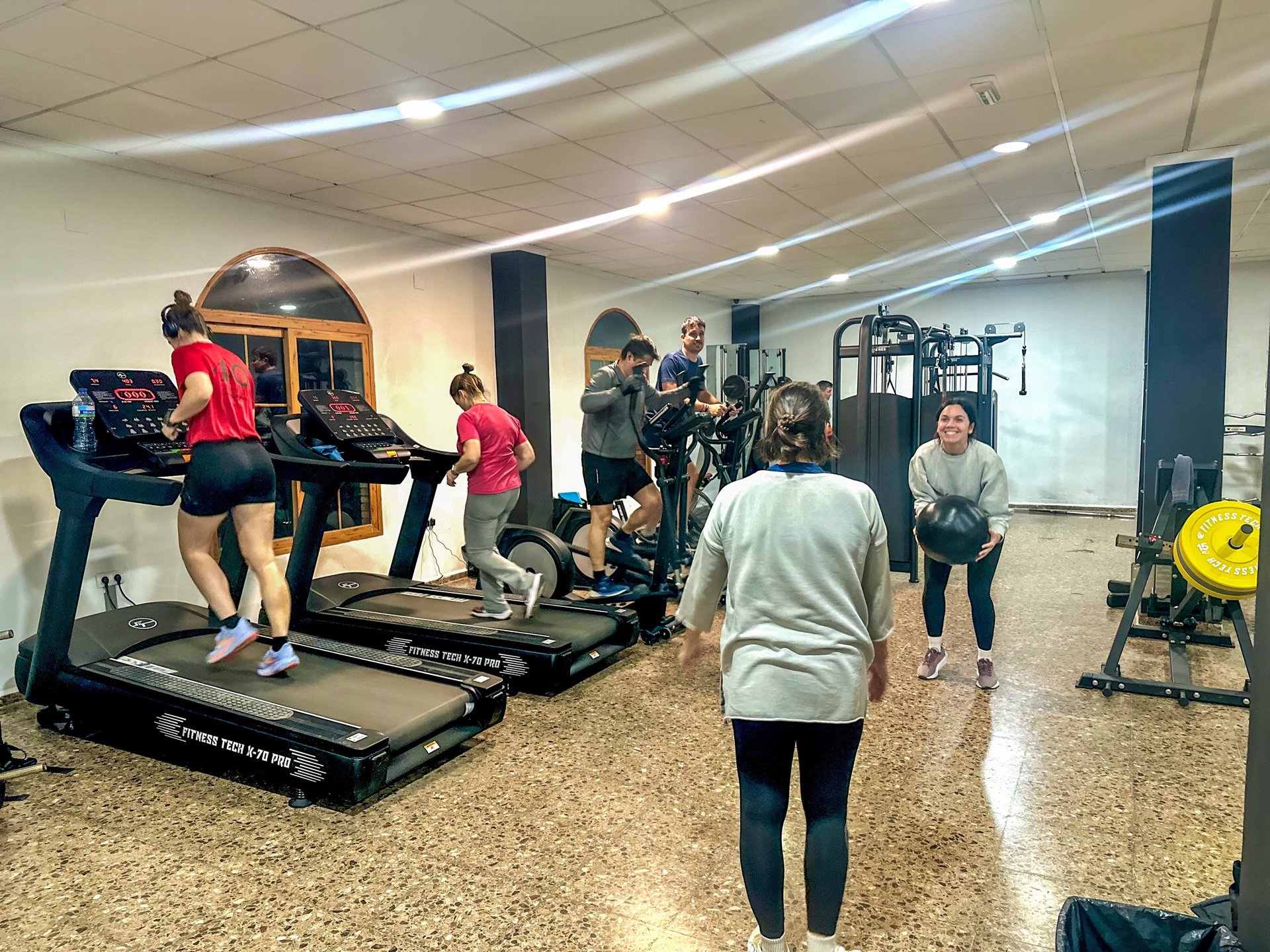 an abstract photo of a curved building with a blue sky in the background
