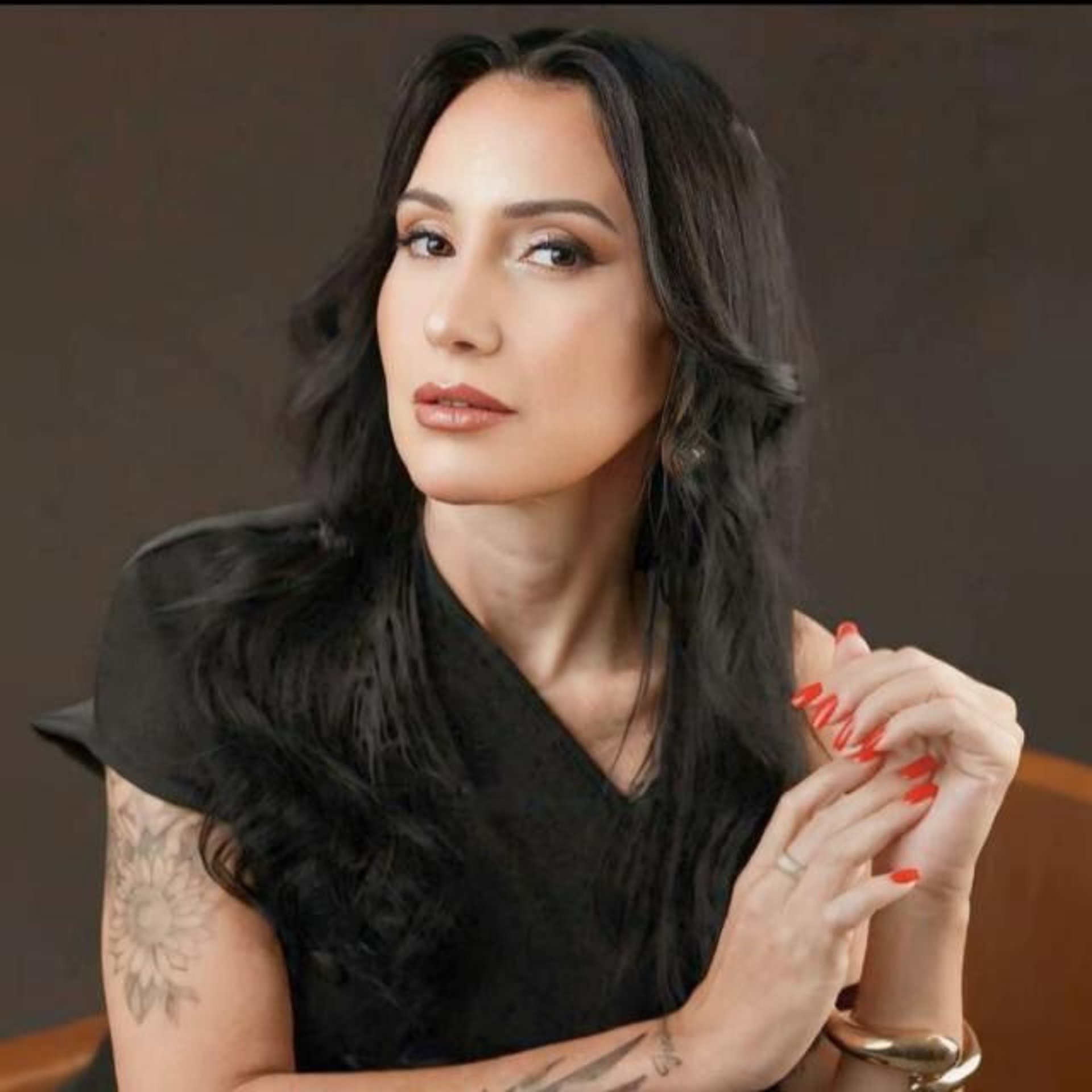 black and brown leather padded tub sofa