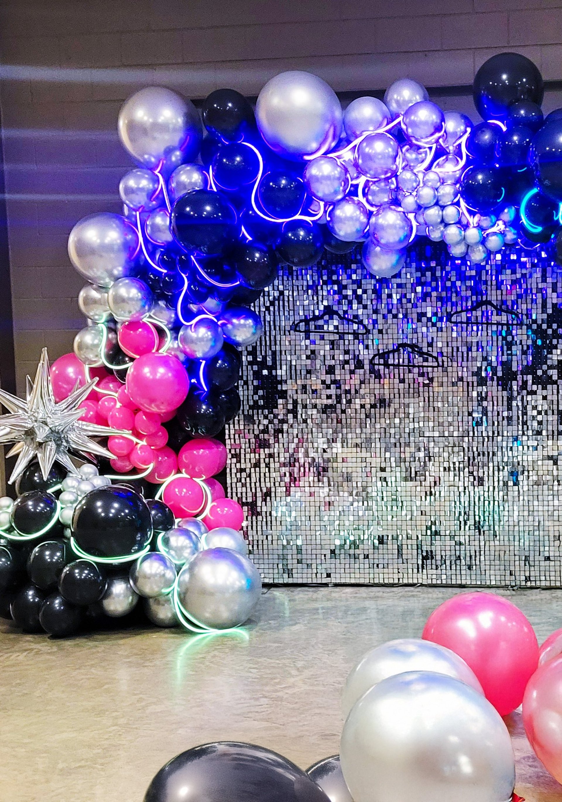 an abstract photo of a curved building with a blue sky in the background