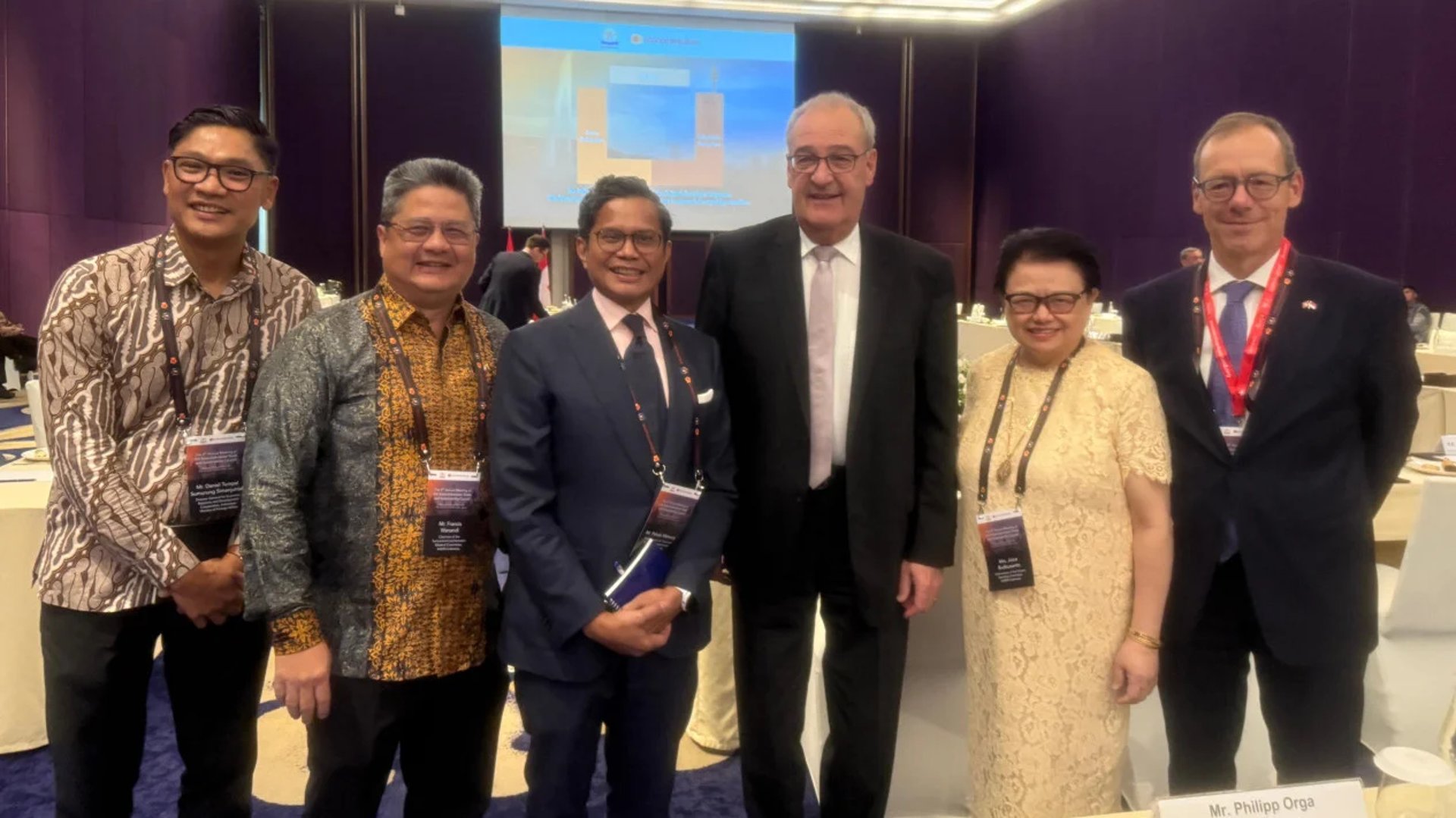 an abstract photo of a curved building with a blue sky in the background