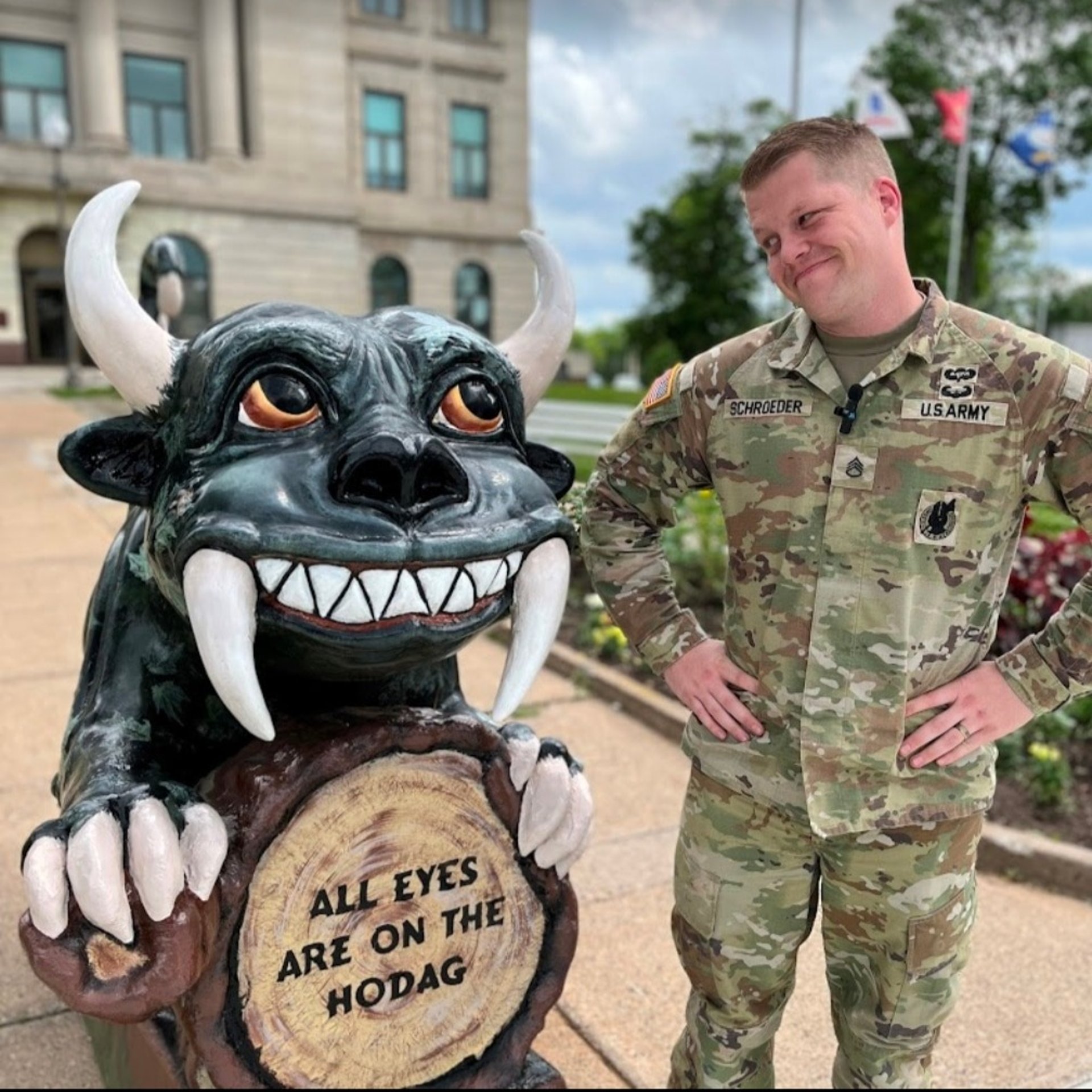 woman wearing yellow long-sleeved dress under white clouds and blue sky during daytime