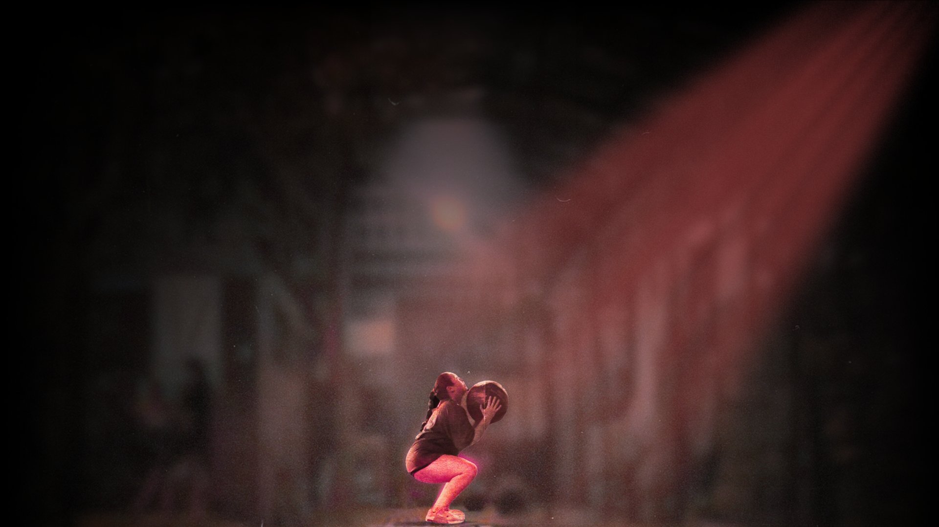 an abstract photo of a curved building with a blue sky in the background