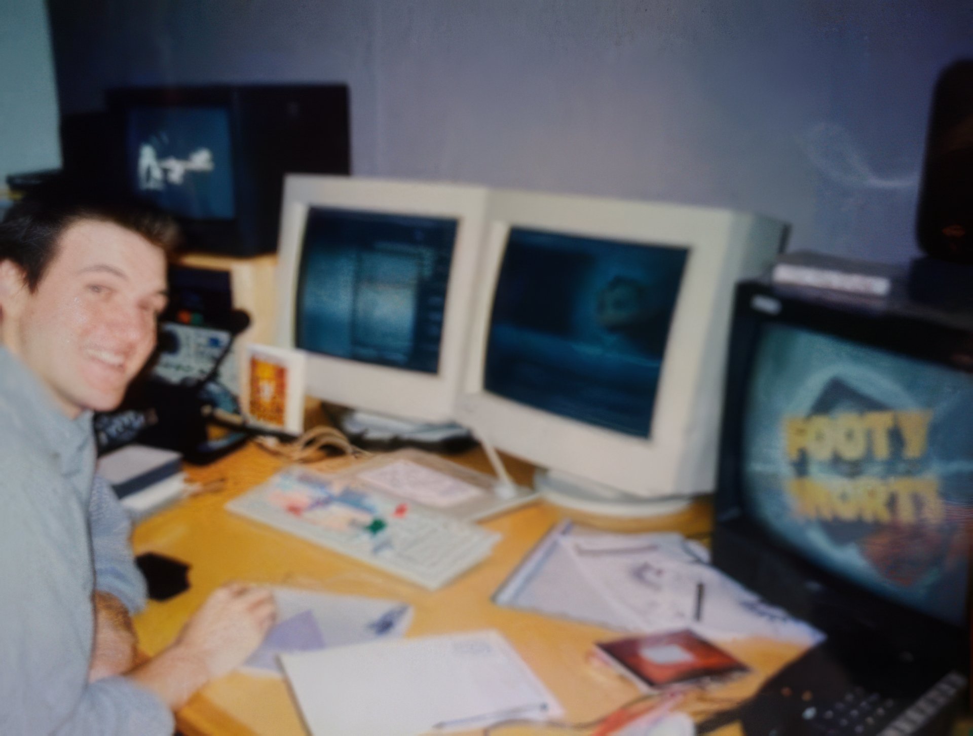 woman sitting at desk with desktop computer