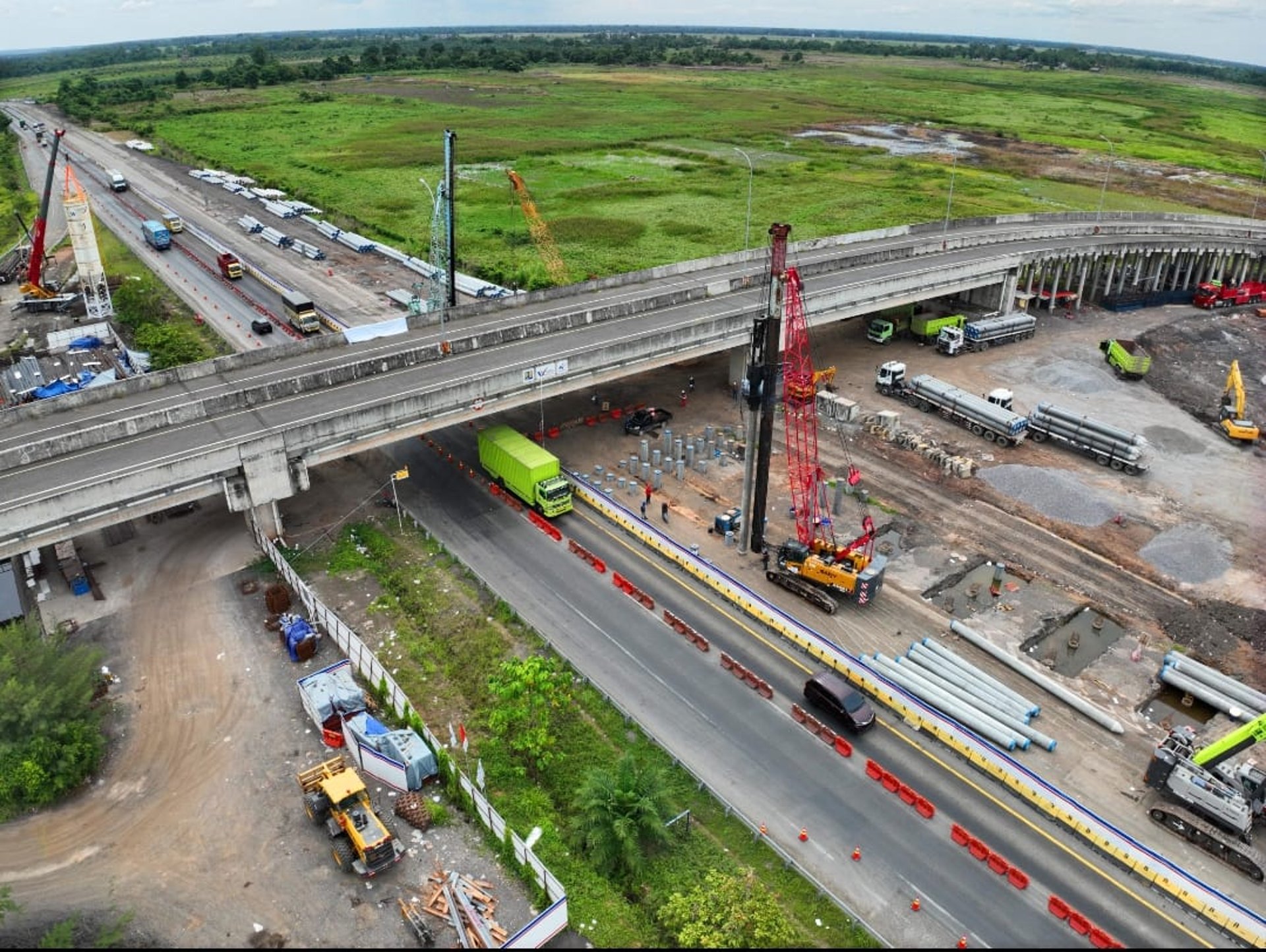 woman wearing yellow long-sleeved dress under white clouds and blue sky during daytime