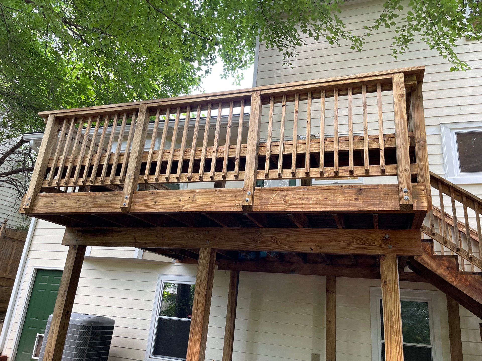 black and brown leather padded tub sofa