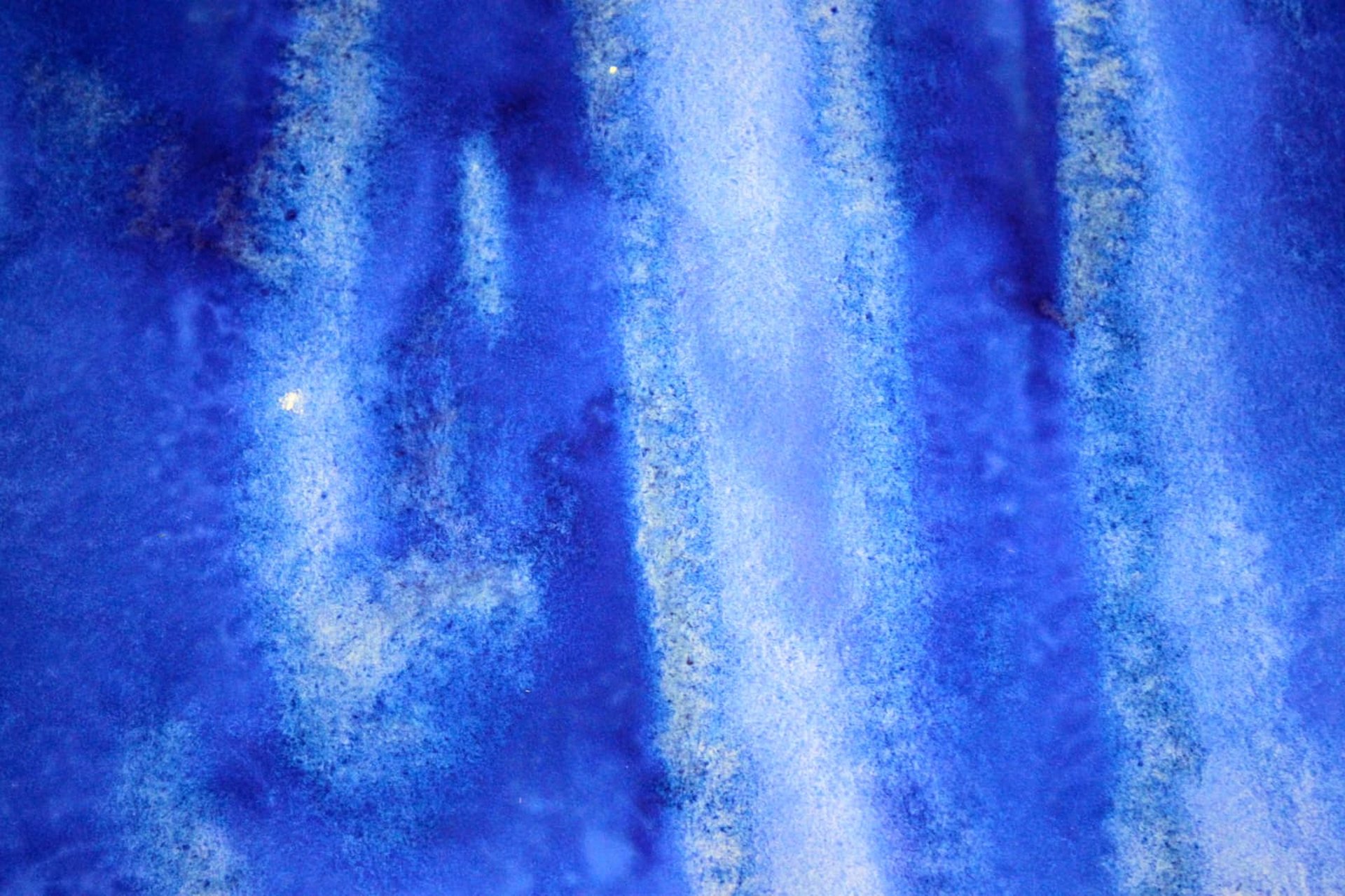 group of women standing on green grass field during daytime