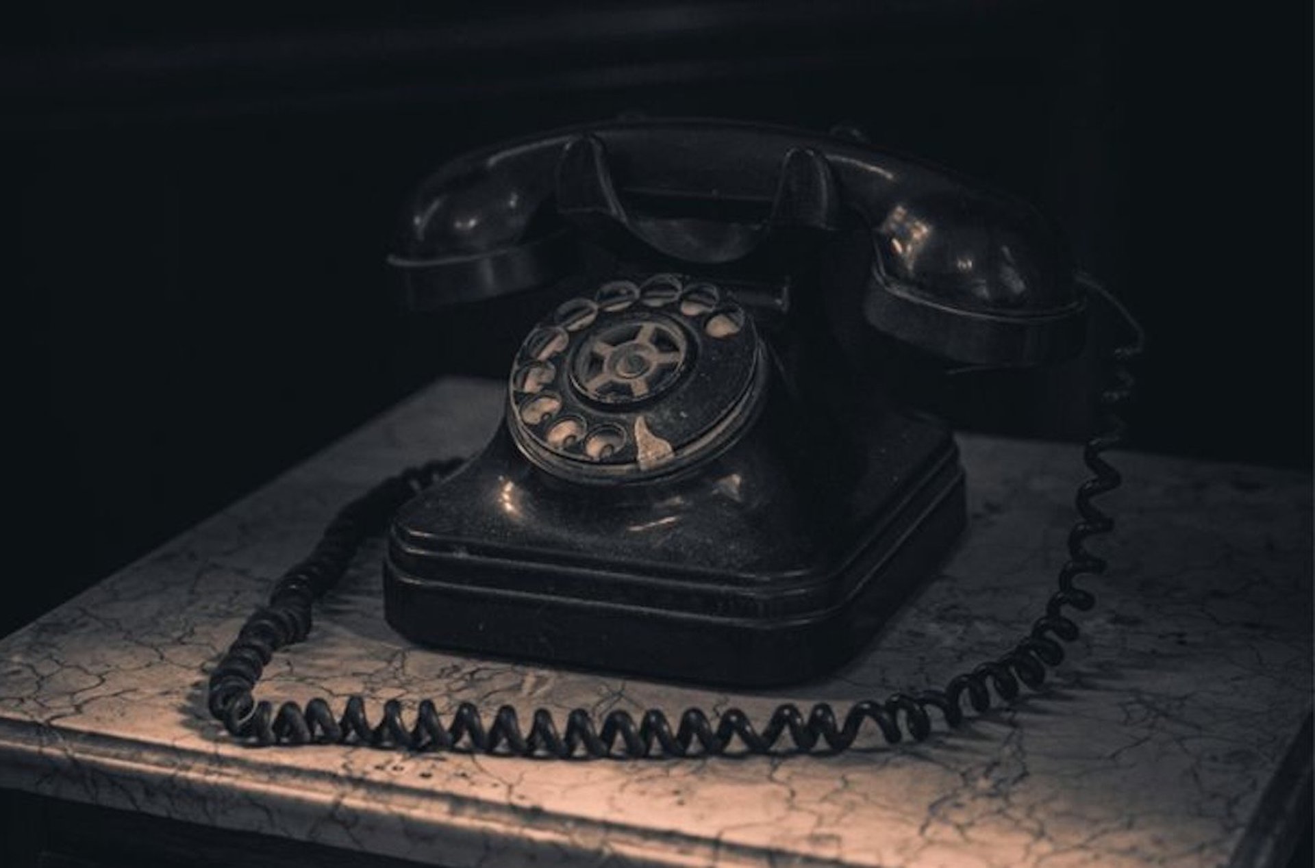 woman holding silver iPhone 6
