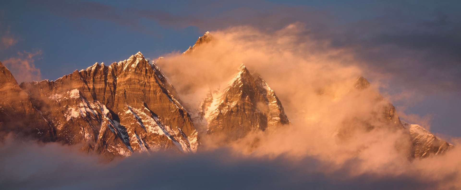 black and brown leather padded tub sofa