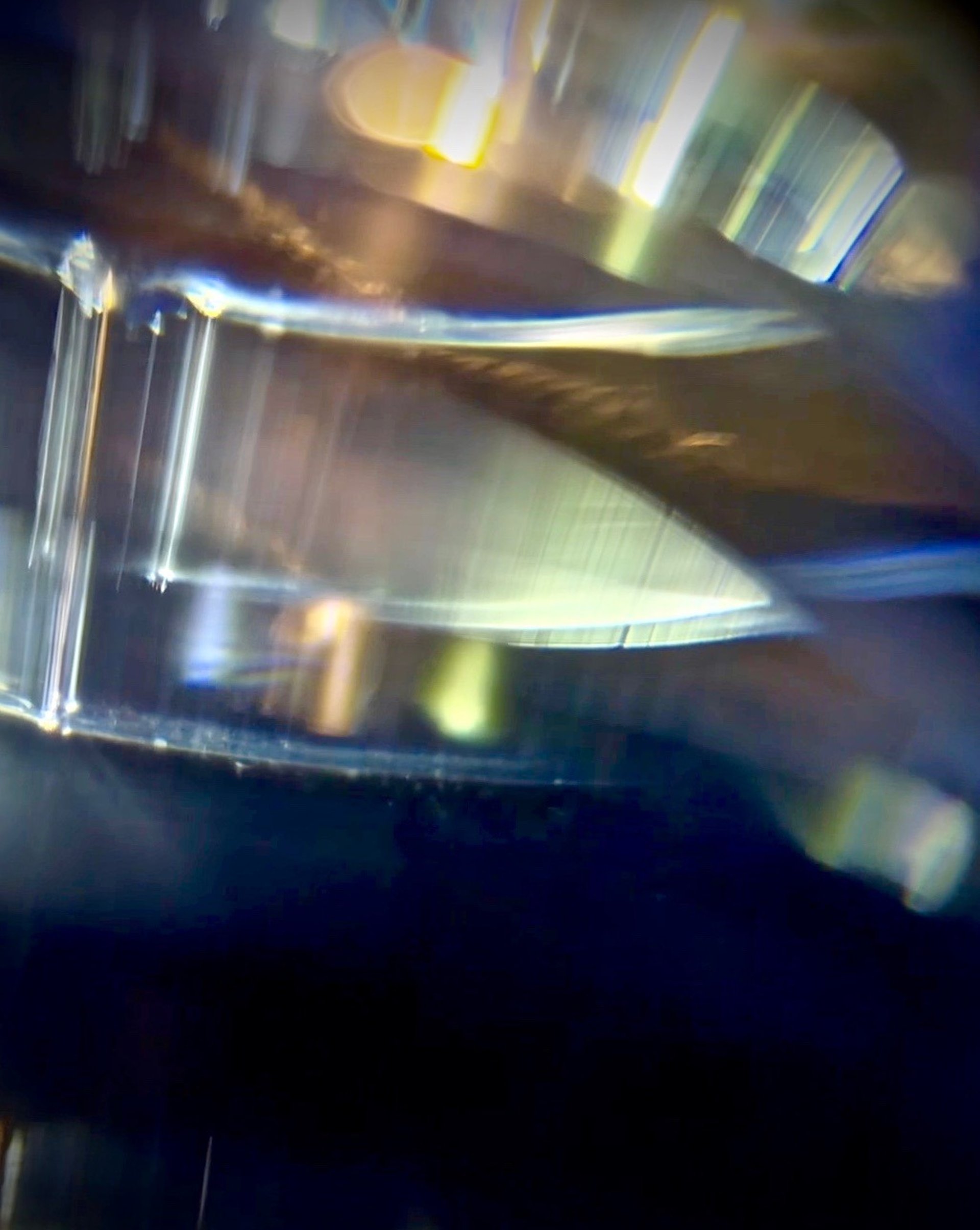 a dark room with light coming through a window