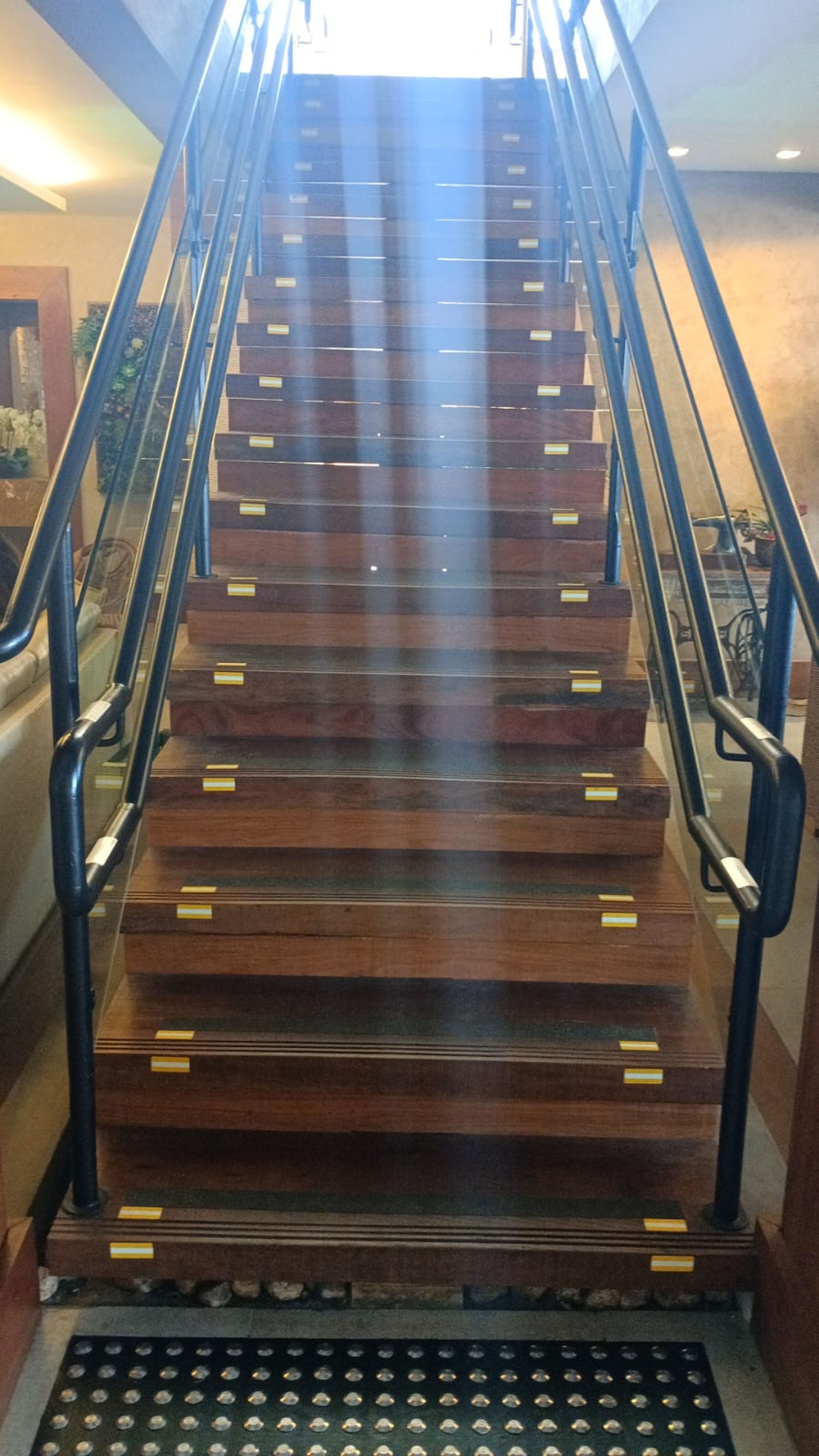 black and brown leather padded tub sofa